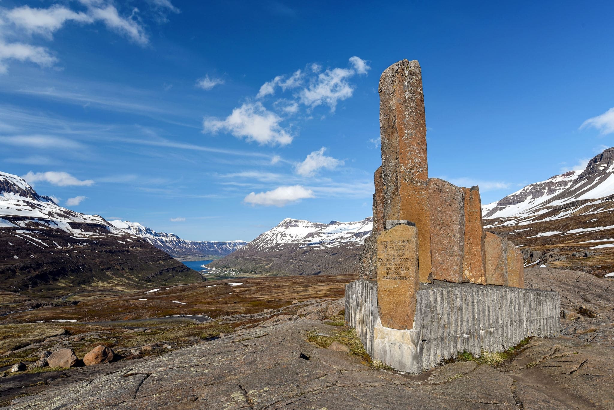 Monument to Þorbjörn Arnoddsson looking northeast down the glacial valley at Seydisfjordur in northeast Iceland.