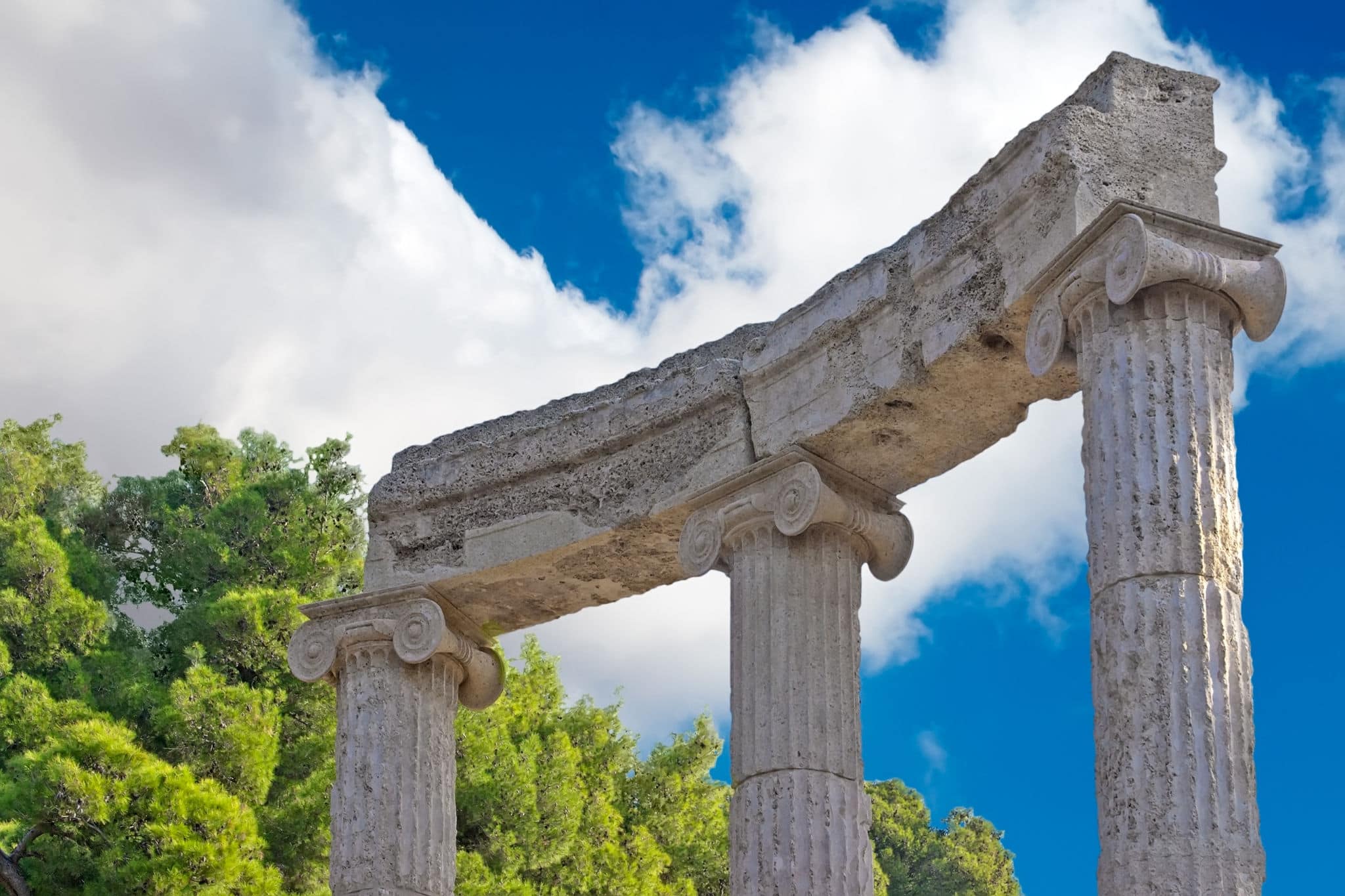 Ancient ruins of the Philippeion at Olympia, Greece. Detailed view of the Philippeion, showing the construction of the crepidoma. UNESCO world heritage site.