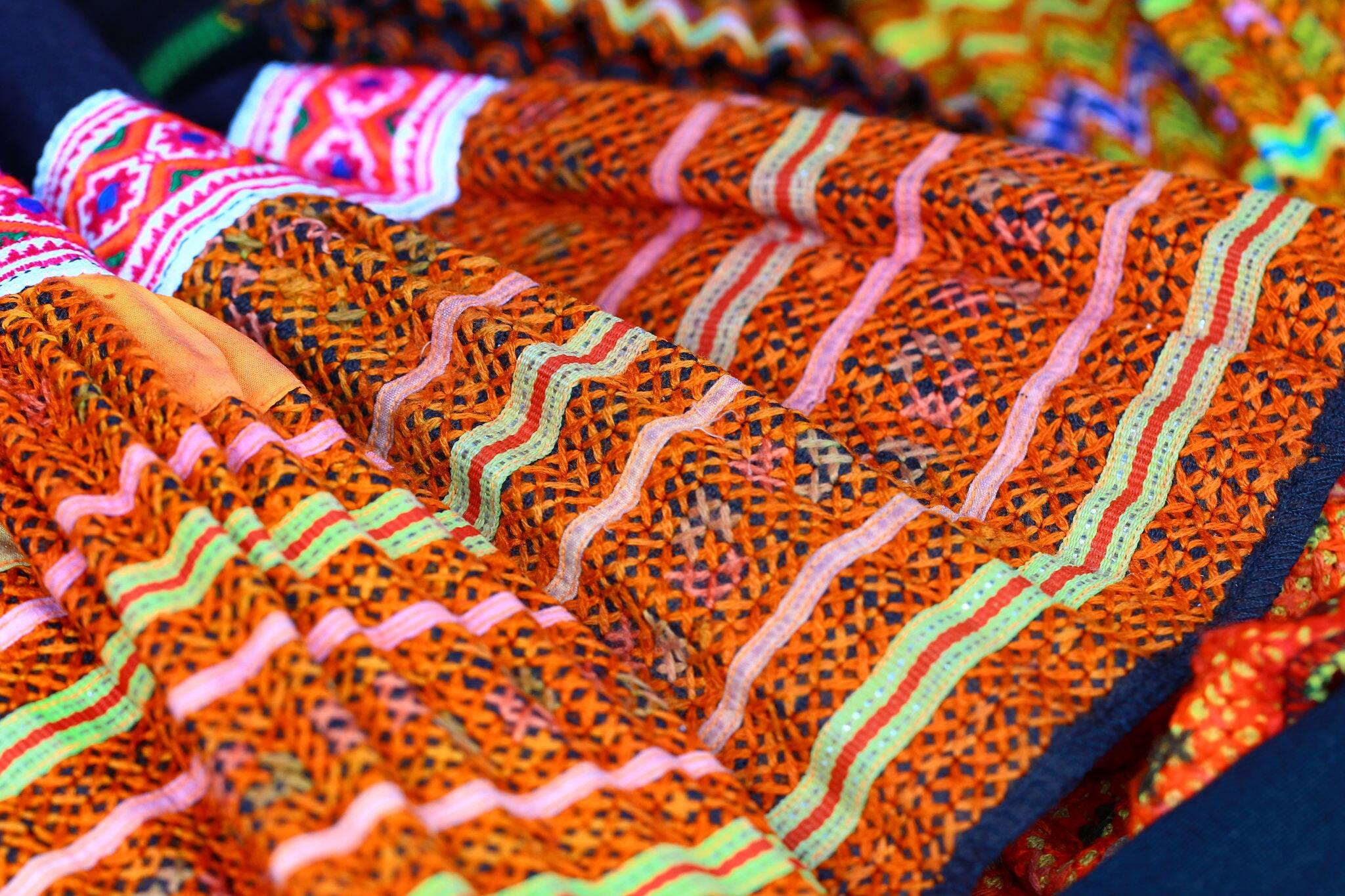 Cloth handicraft (hand-woven) colorful hilltribe in northern Thailand,Woven pattern,Woven,finger weaving.