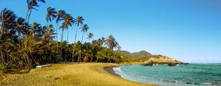 Beautiful beach panorama view of Tayrona National Park, protected area in the caribbean region of Colombia