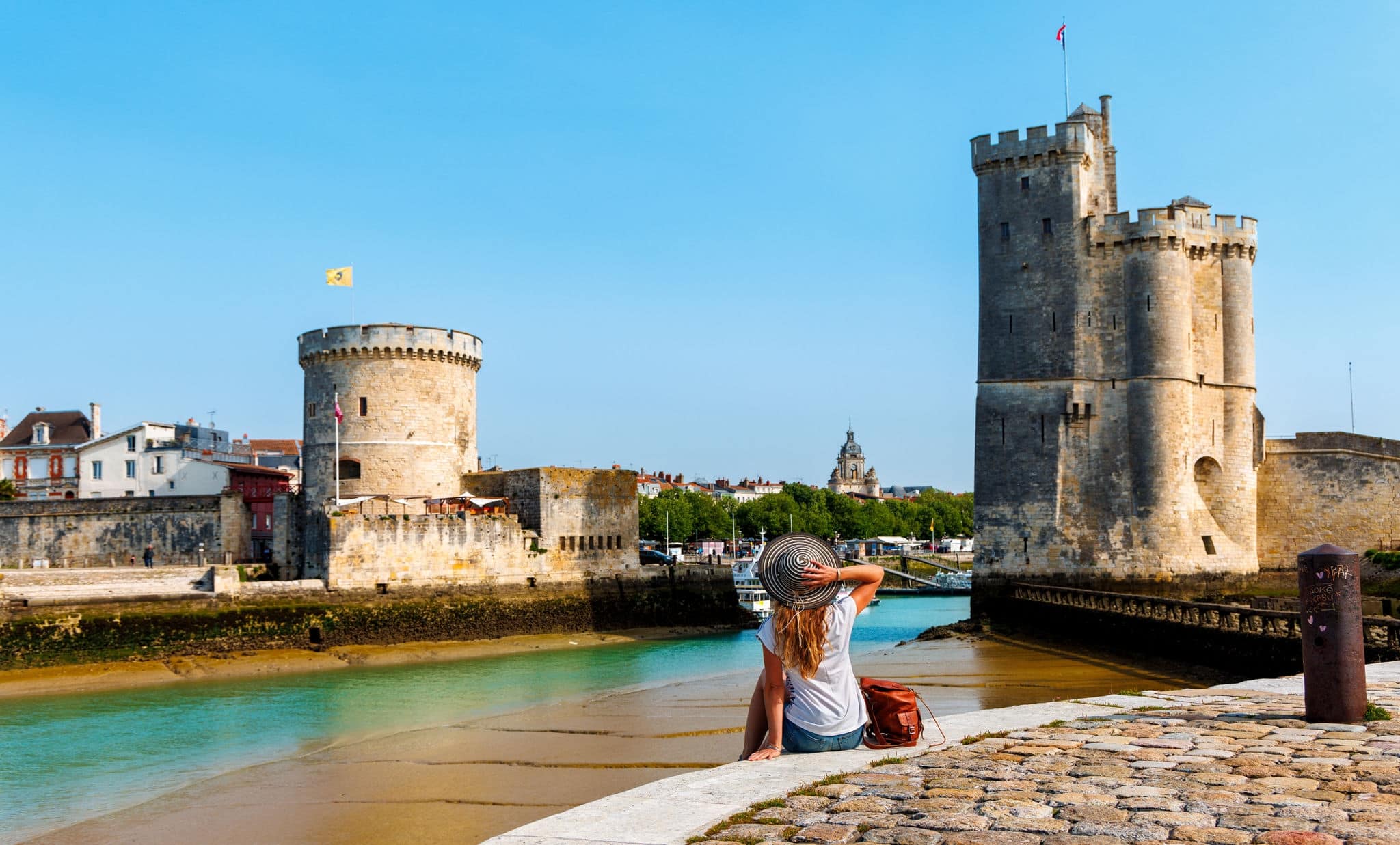 Woman tourist visiting La Rochelle- Tour tourism in France, Charente Maritime
