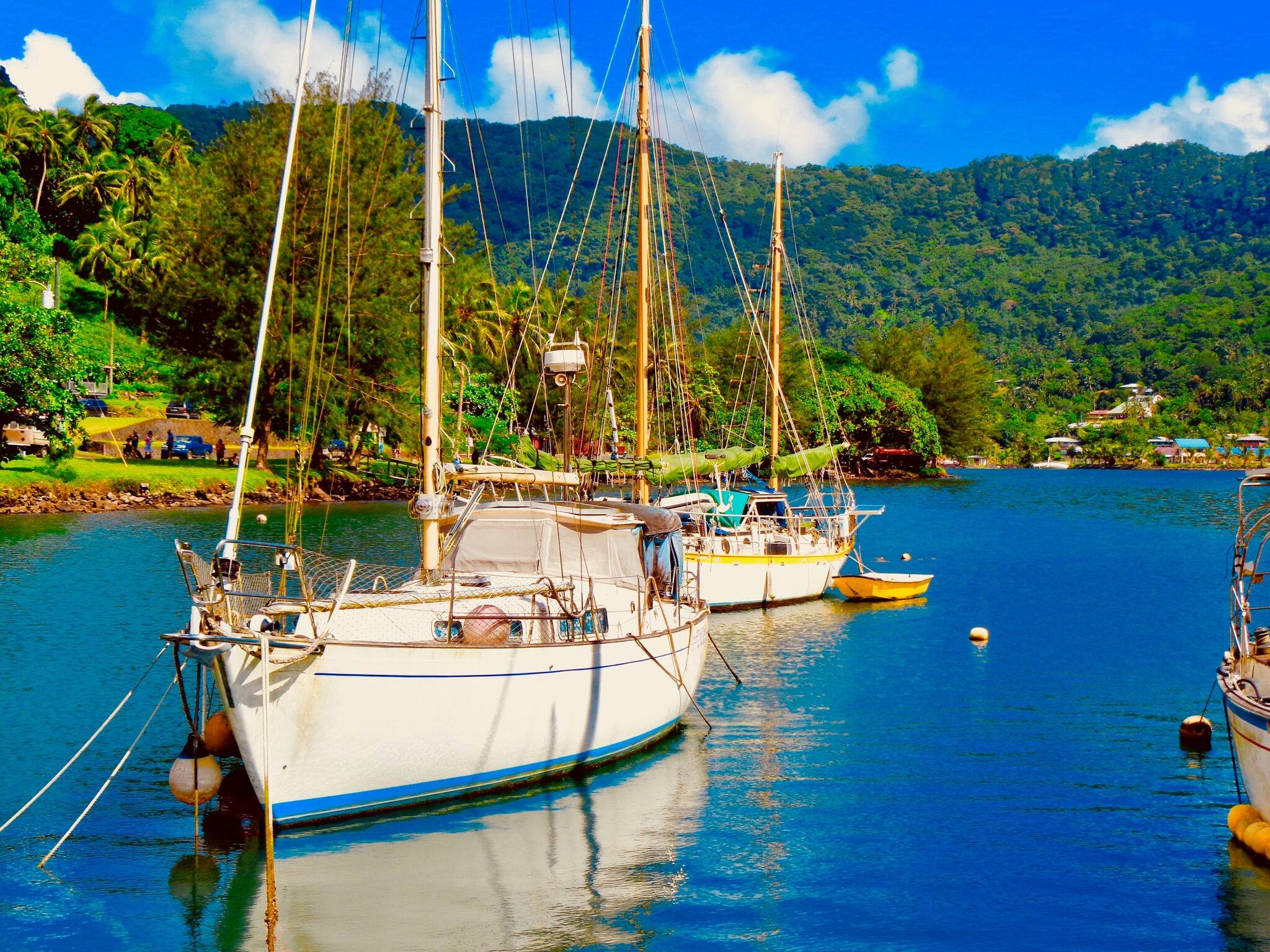 Sailboats in the harbor of Pago Pago, American Samoa                             