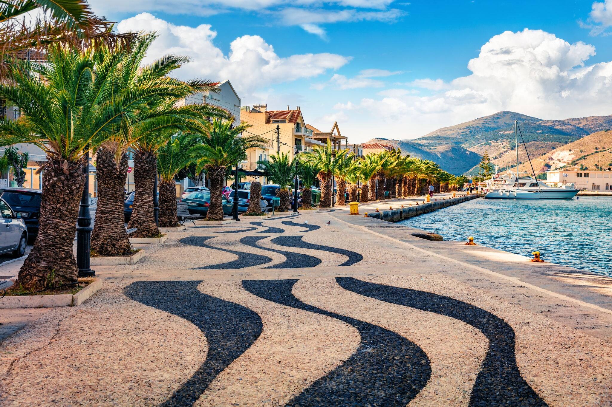 Attractive spring cityscape of Argostoli port. Romantic morning scene of Kefalonia island, Greece, Europe. Beautiful seascape of Ionian Sea. Traveling concept background.