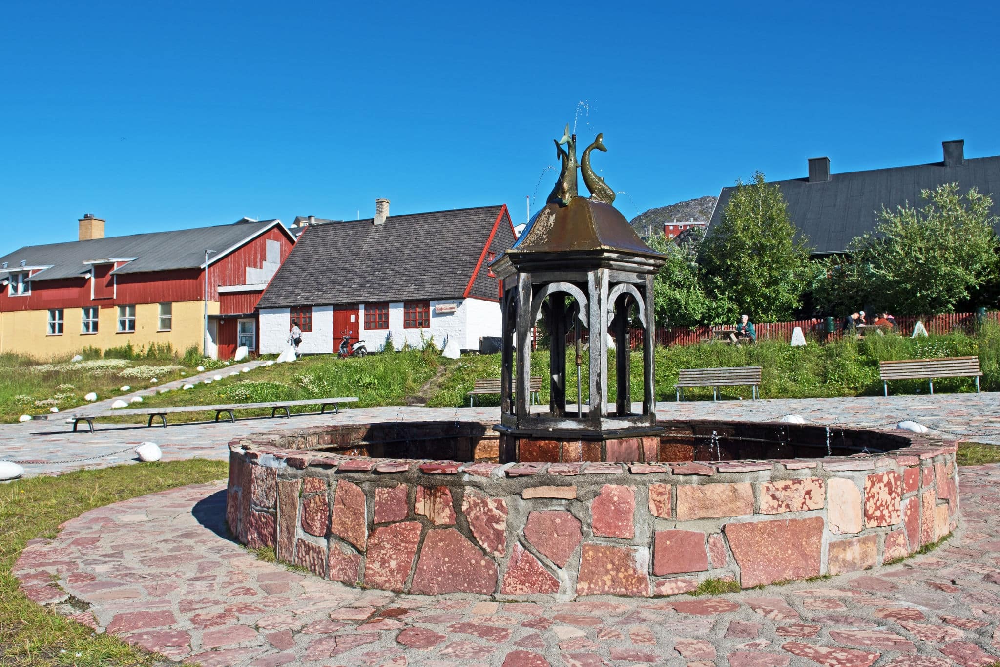A view of the Mindebronden or Memorial Fountain which dates from 1932 in Qaqortoq, Greenland and is the oldest fountain in the country.