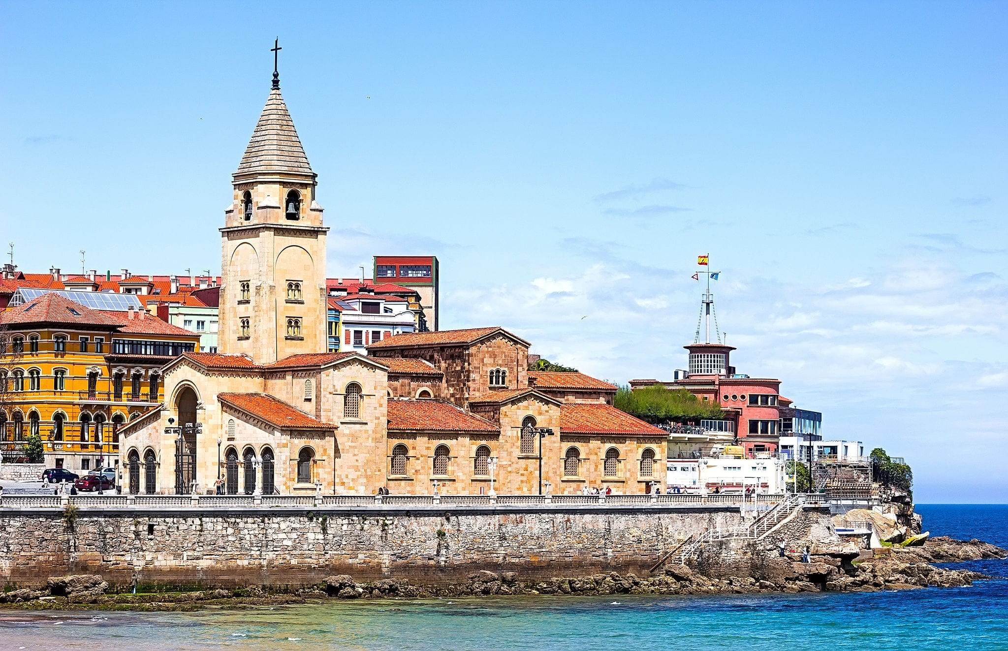 San Pedro church and San Lorenzo beach, Gijon, Asturias, Spain 