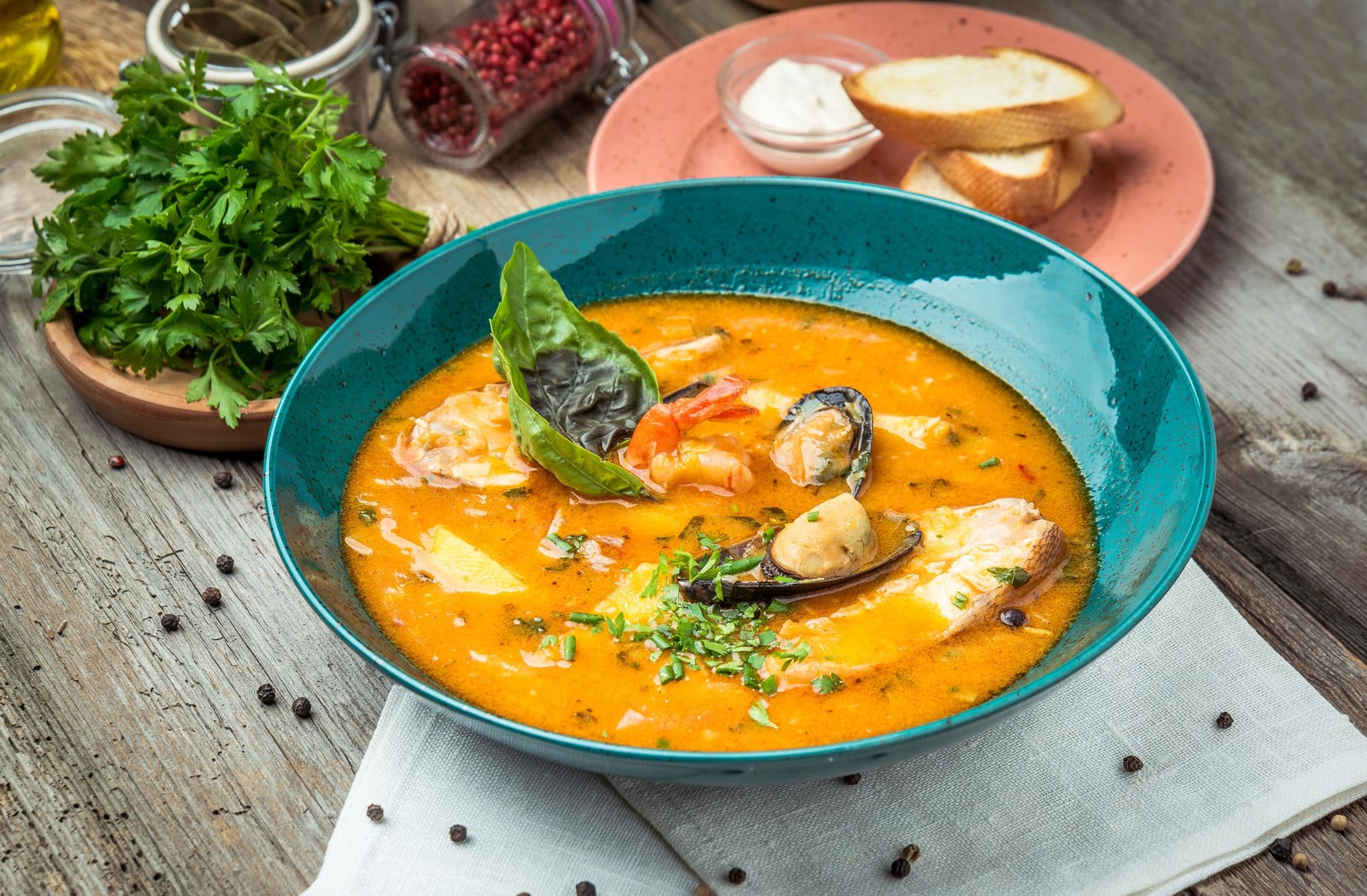 French Bouillabaisse fish soup with seafood, salmon fillet, shrimp, rich taste, tasty dinner