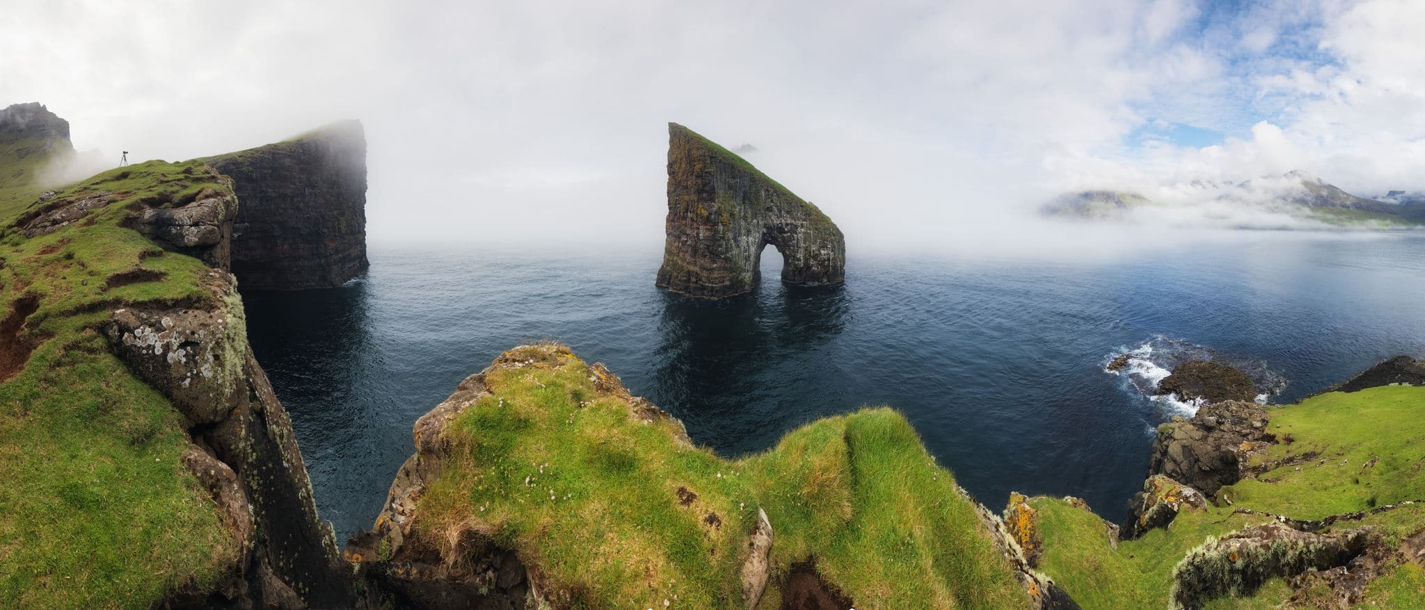 Faroe Island panorama with atlantic ocean and coast cliff, Drangarnir, Denmark