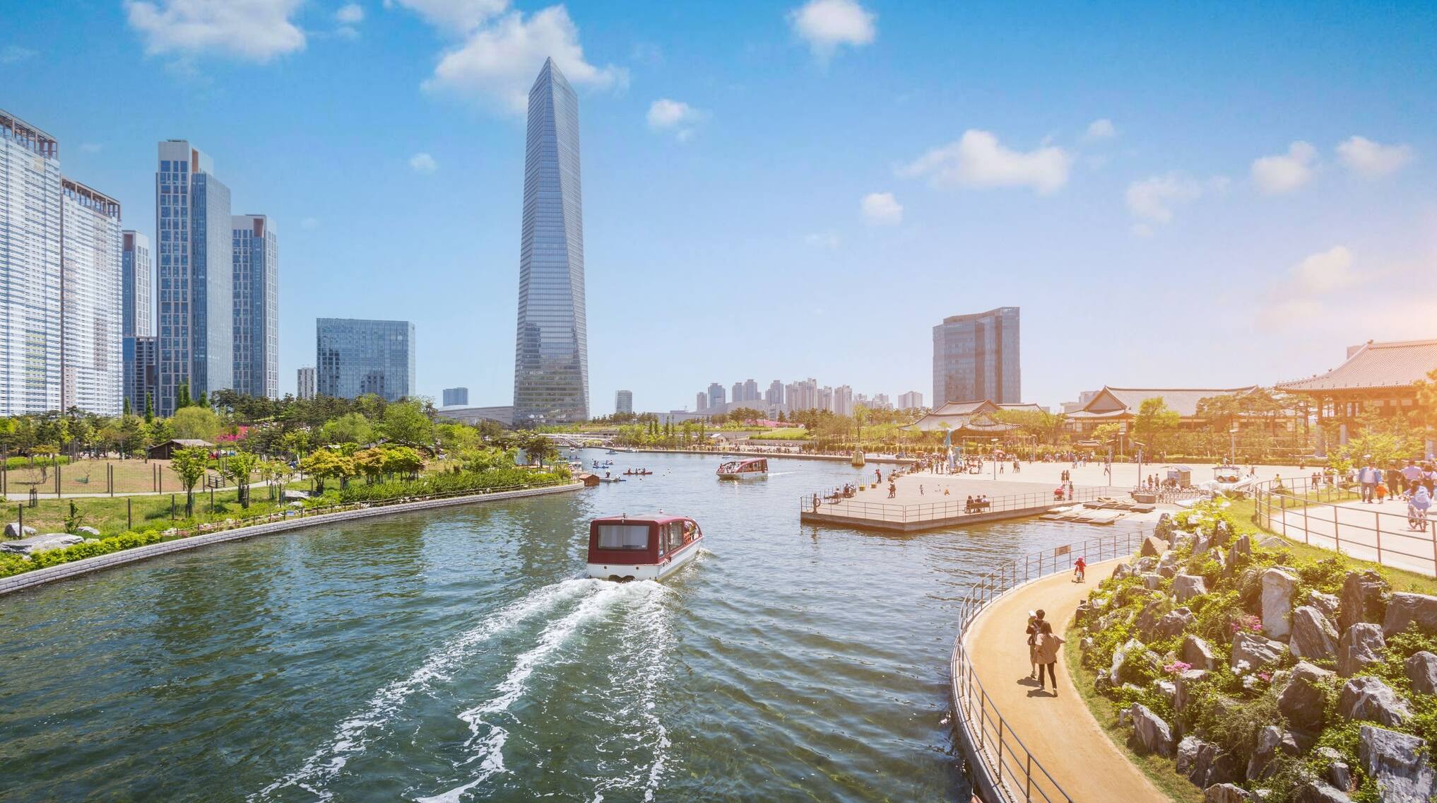 People are riding a tourist boat in summer of Korea at Central Park in Songdo District, Incheon South Korea.