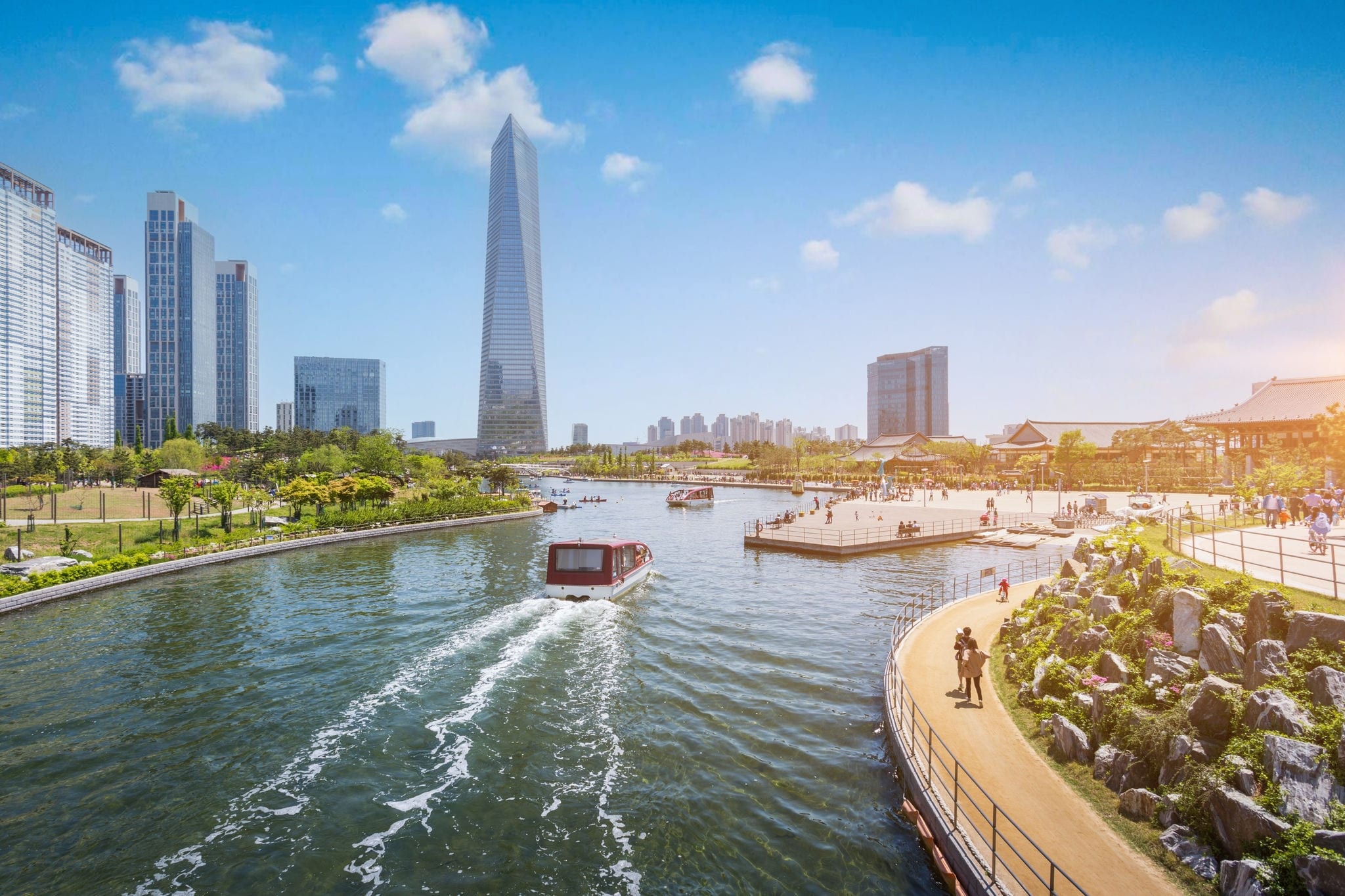 People are riding a tourist boat in summer of Korea at Central Park in Songdo District, Incheon South Korea.