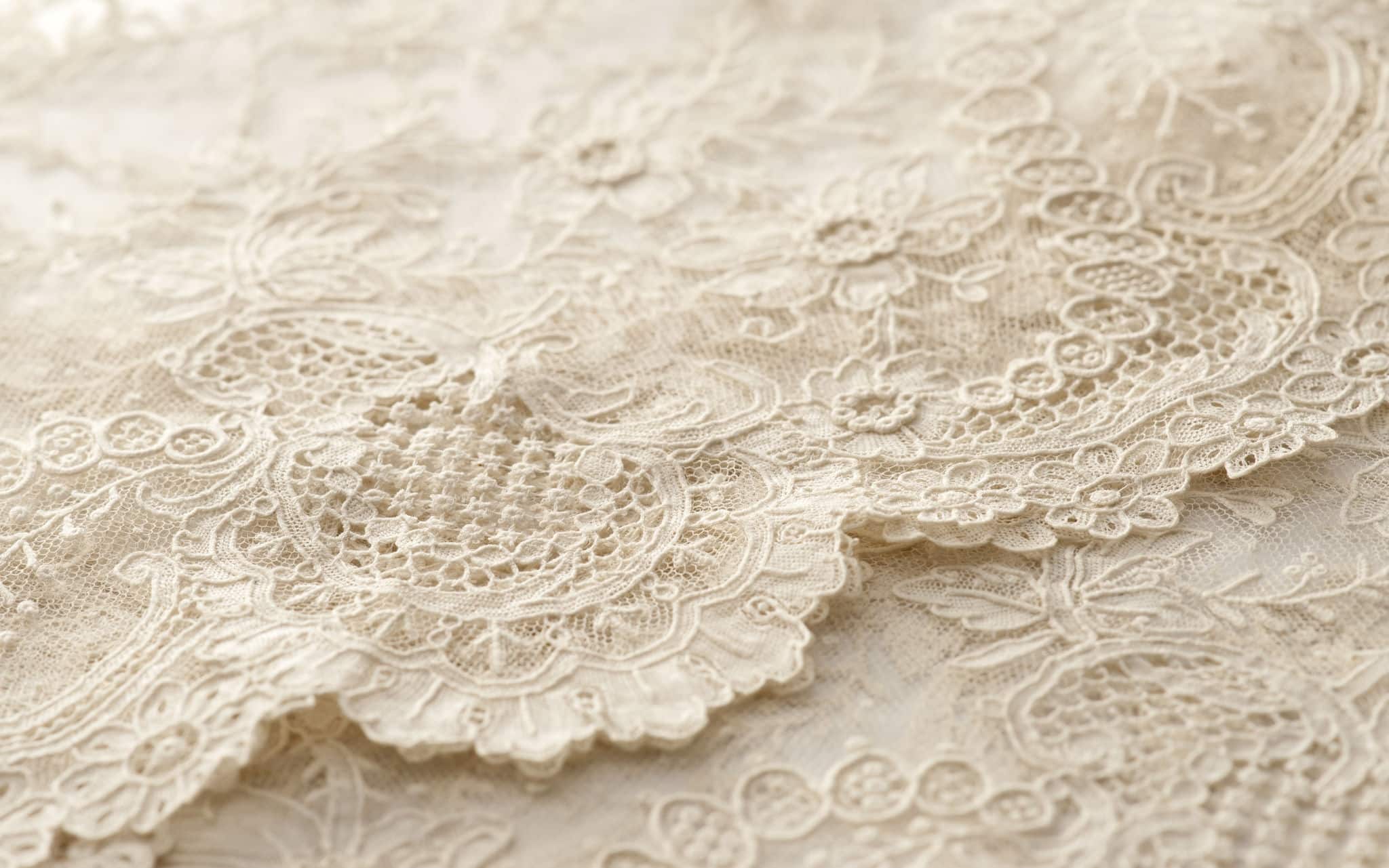 a background image of ivory-colored lace cloth