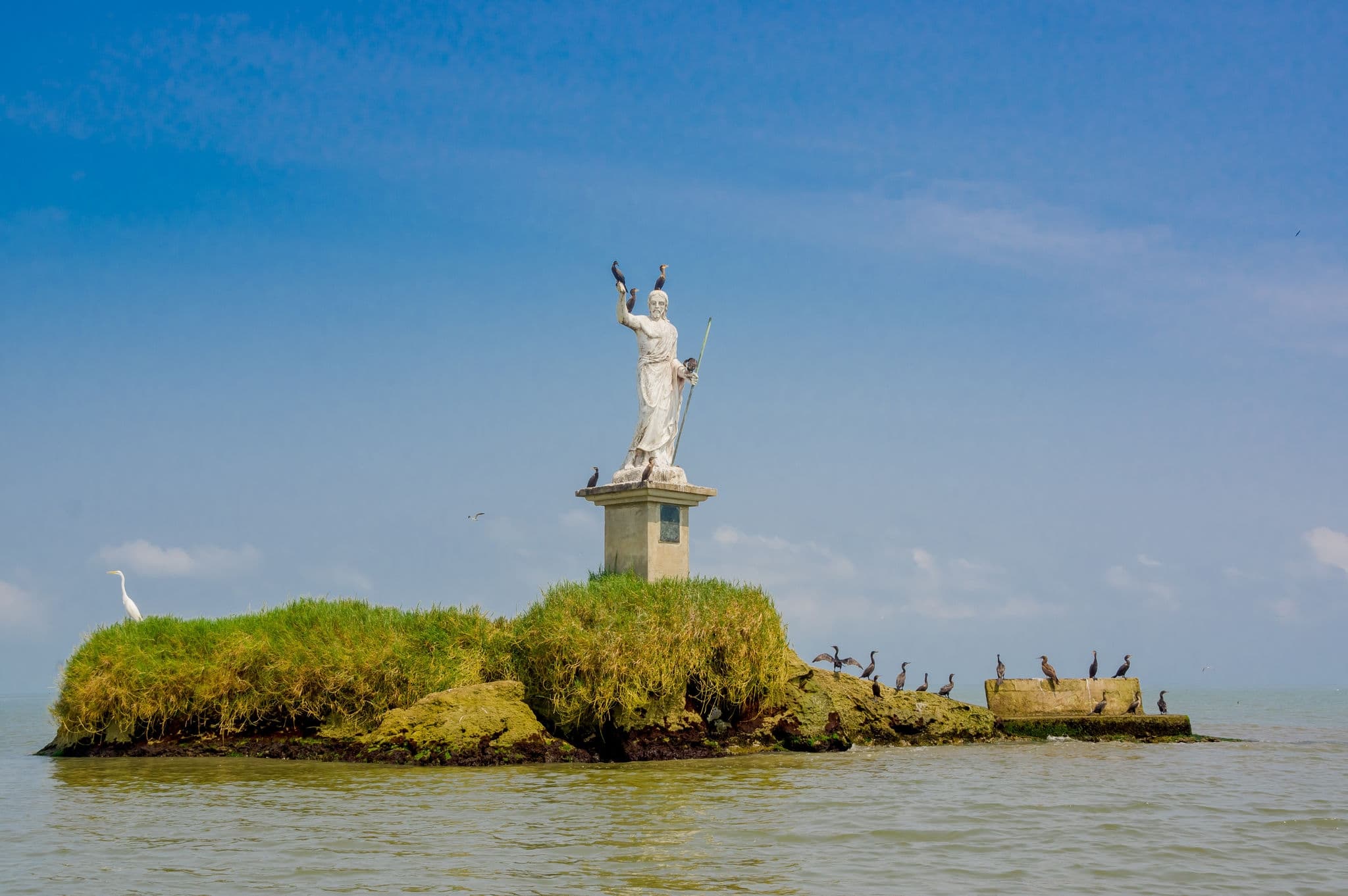 beautiful statue in an island in livingston guatemala