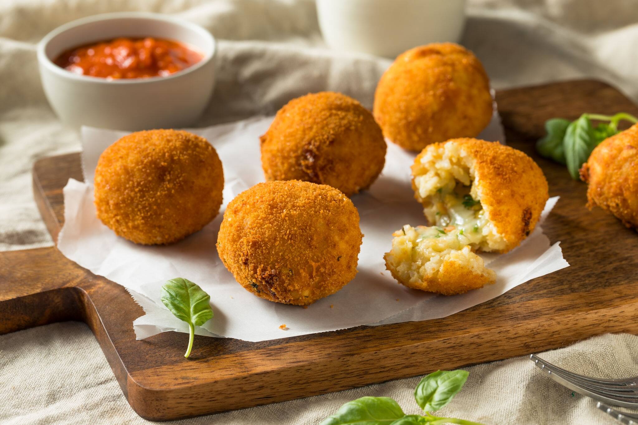 Homemade Deep Fried Risotto Arancini with Basil and Marinara