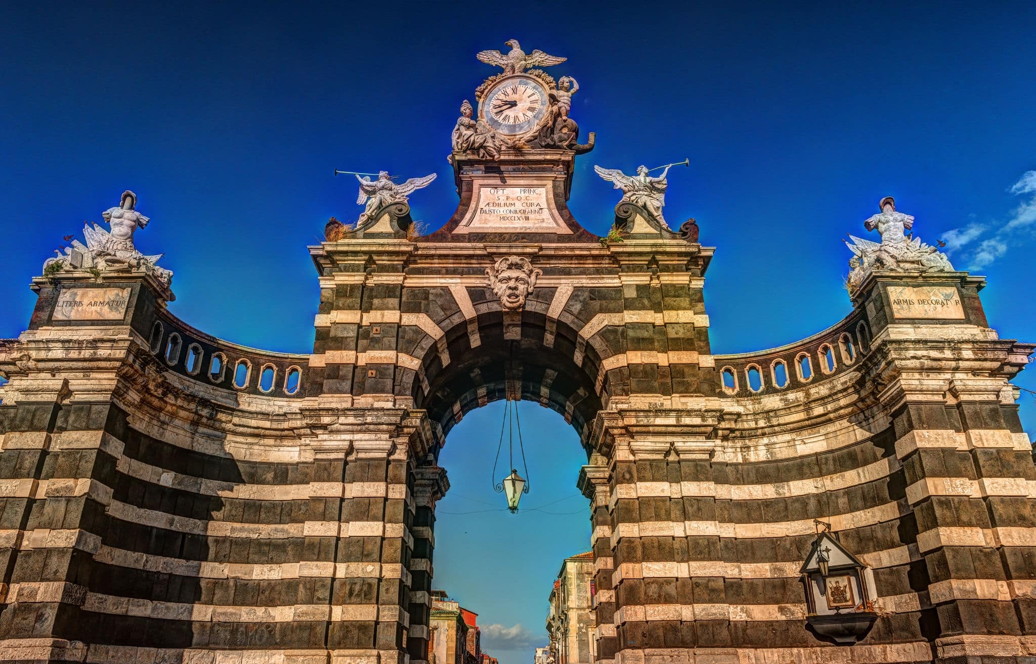 The arch Giuseppe Garibaldi built to honor the Spanish King Ferdinand I, Catania, Sicily. Triumphal arch built in 1768 - famous landmark of the city.
