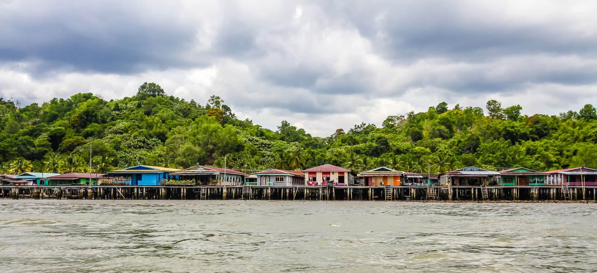 Wooden Bridges and Colorful Houses of Water Village with Green Forest in the Background-Bandar Seri Begawan, Brunei