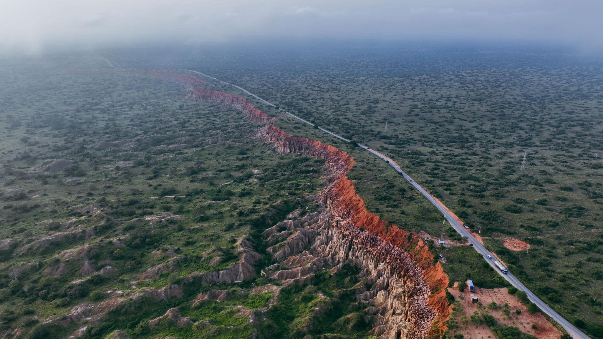 Breathtaking view of the Moon landscape in Angola showcasing stunning red cliffs and winding roads