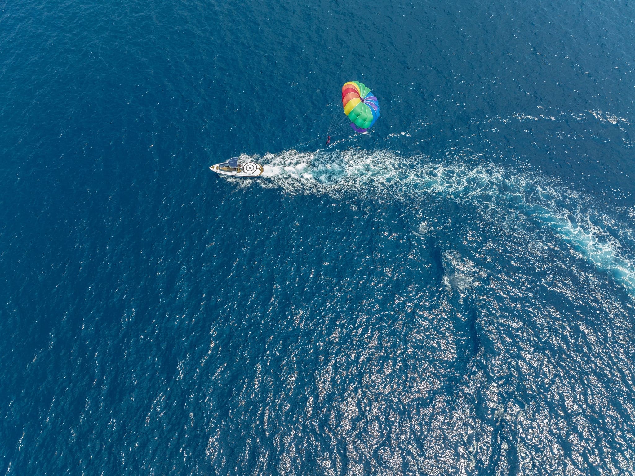 Aerial View of a paraglider on North Malé Atoll, Indian Ocean.