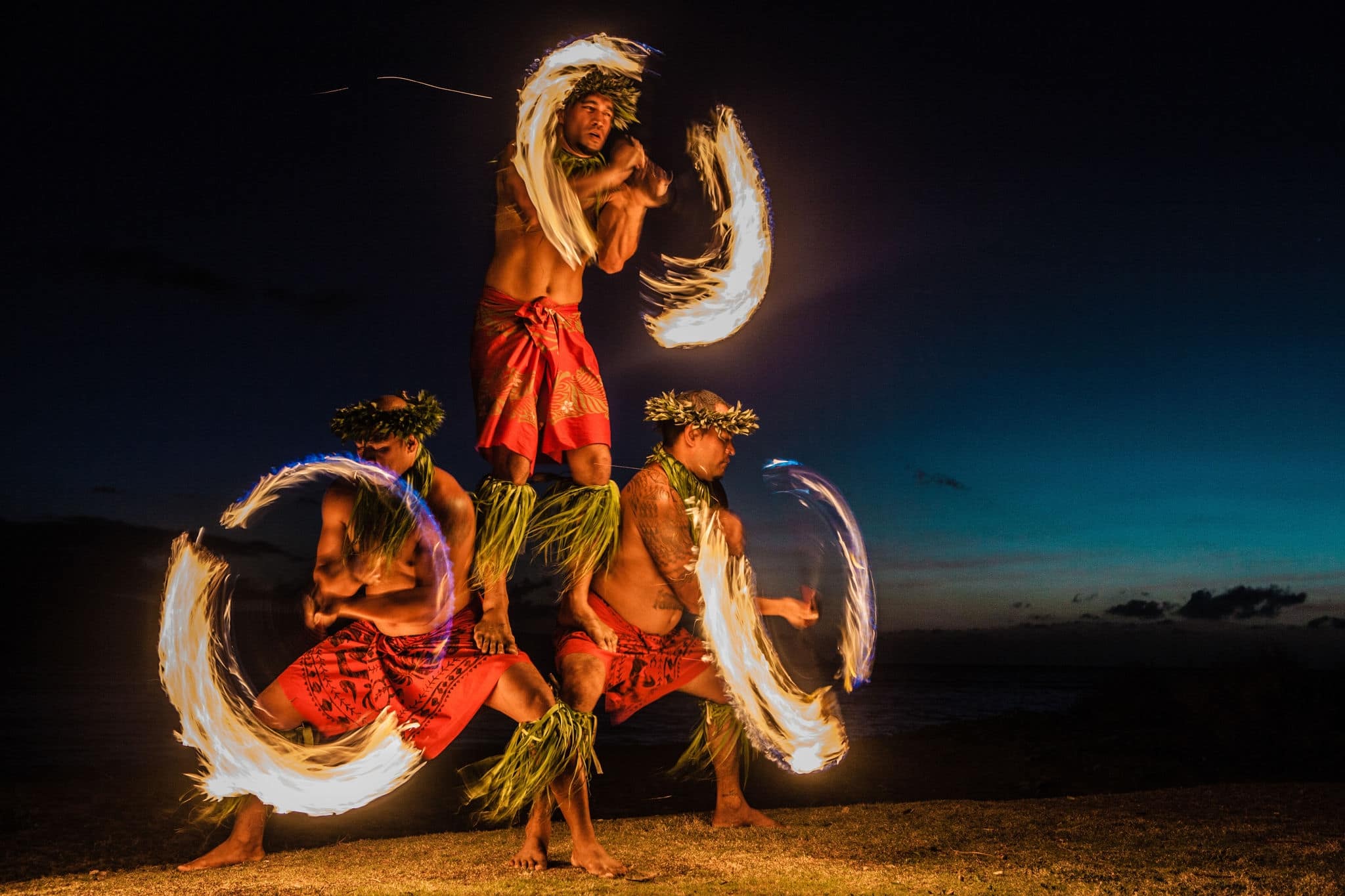 Three Strong Men Juggling Fire in Hawaii - Fire Dancers