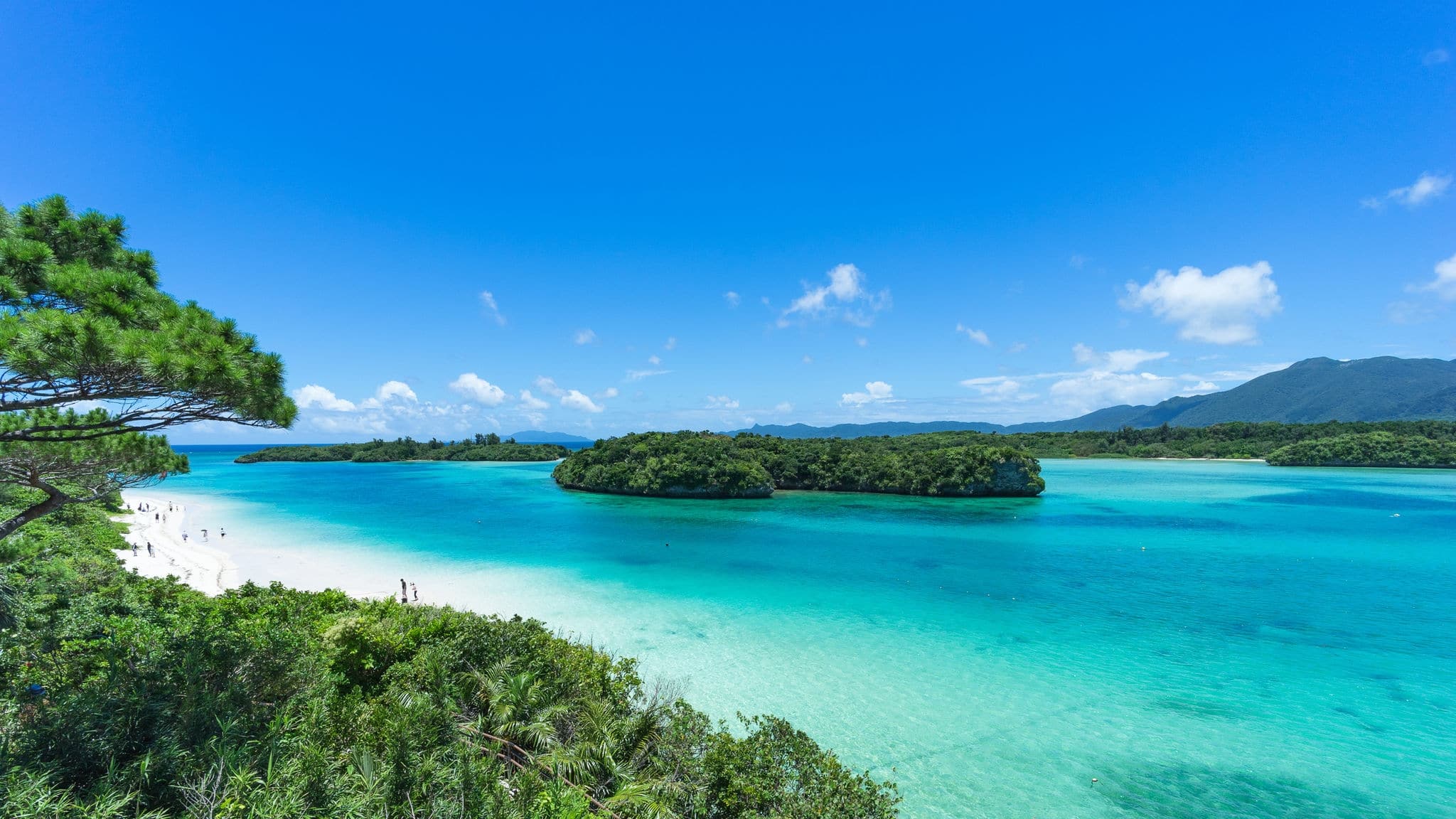 Tropical paradise lagoon, clear turquoise water and coral rock islands, Kabira Bay, Ishigaki Island National Park of the Yaeyama Islands, Okinawa, Japan
