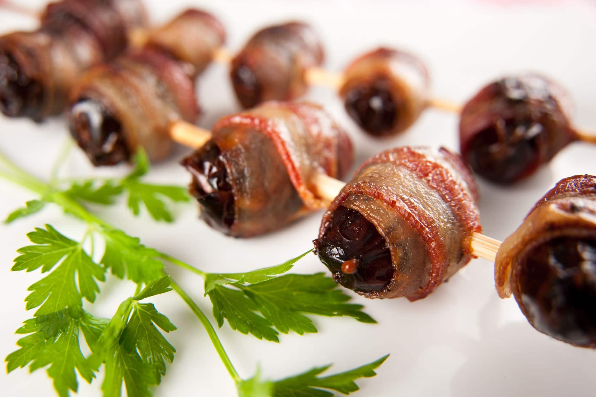 Medjool Dates Wrapped in Bacon and Baked on Skewers