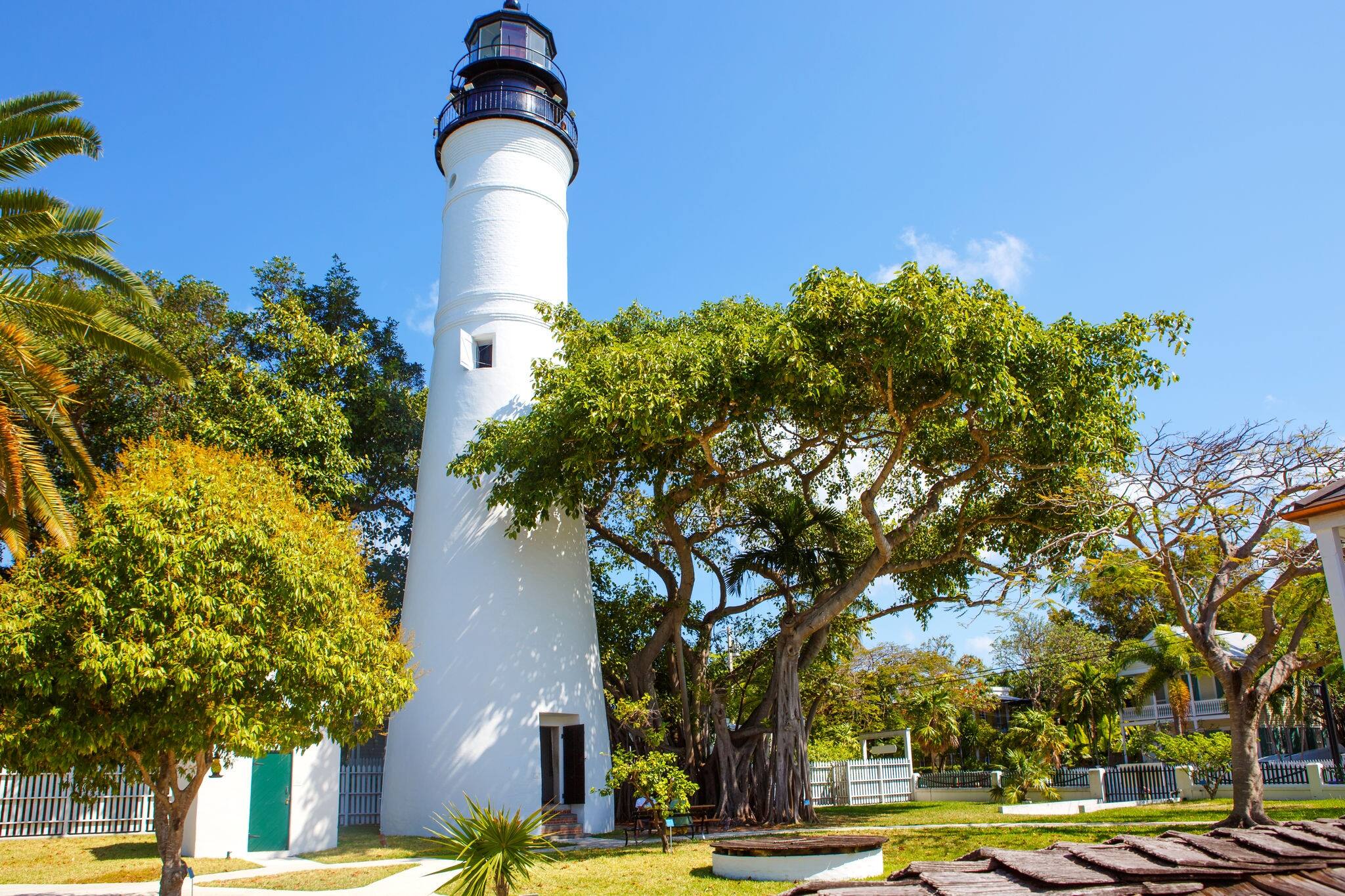 The historic and popular center, lighthouse and Duval Street in downtown Key West. Beautiful small town in Florida, United States of America