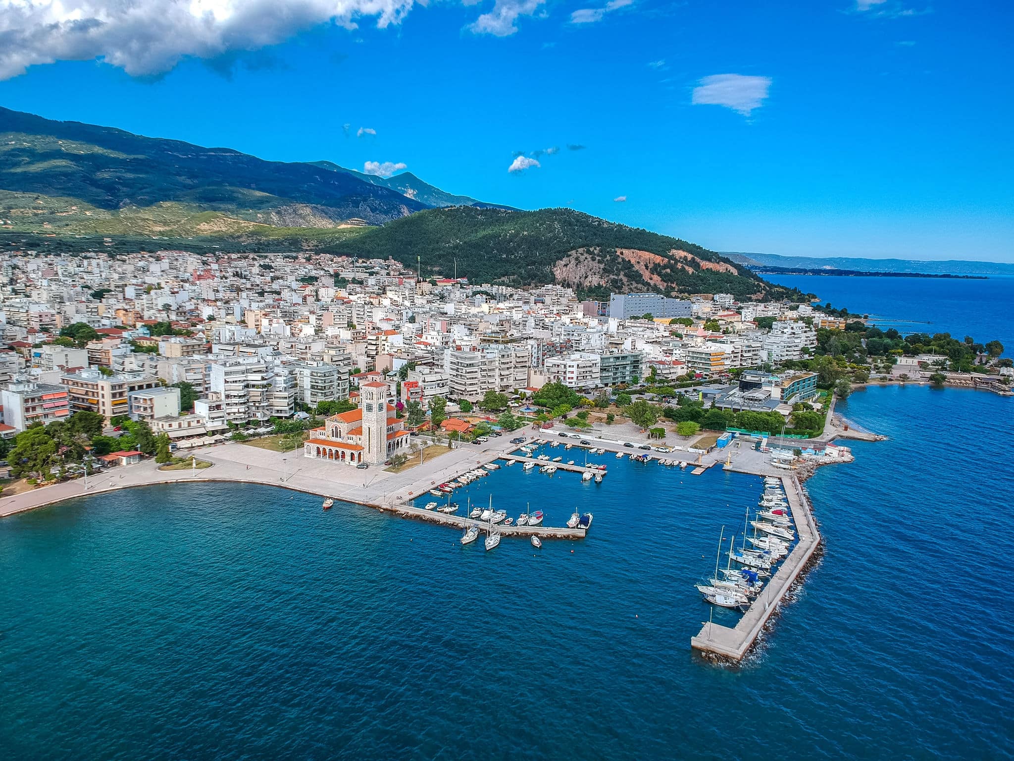 Aerial panoramic view of Volos city, Greece at sunset