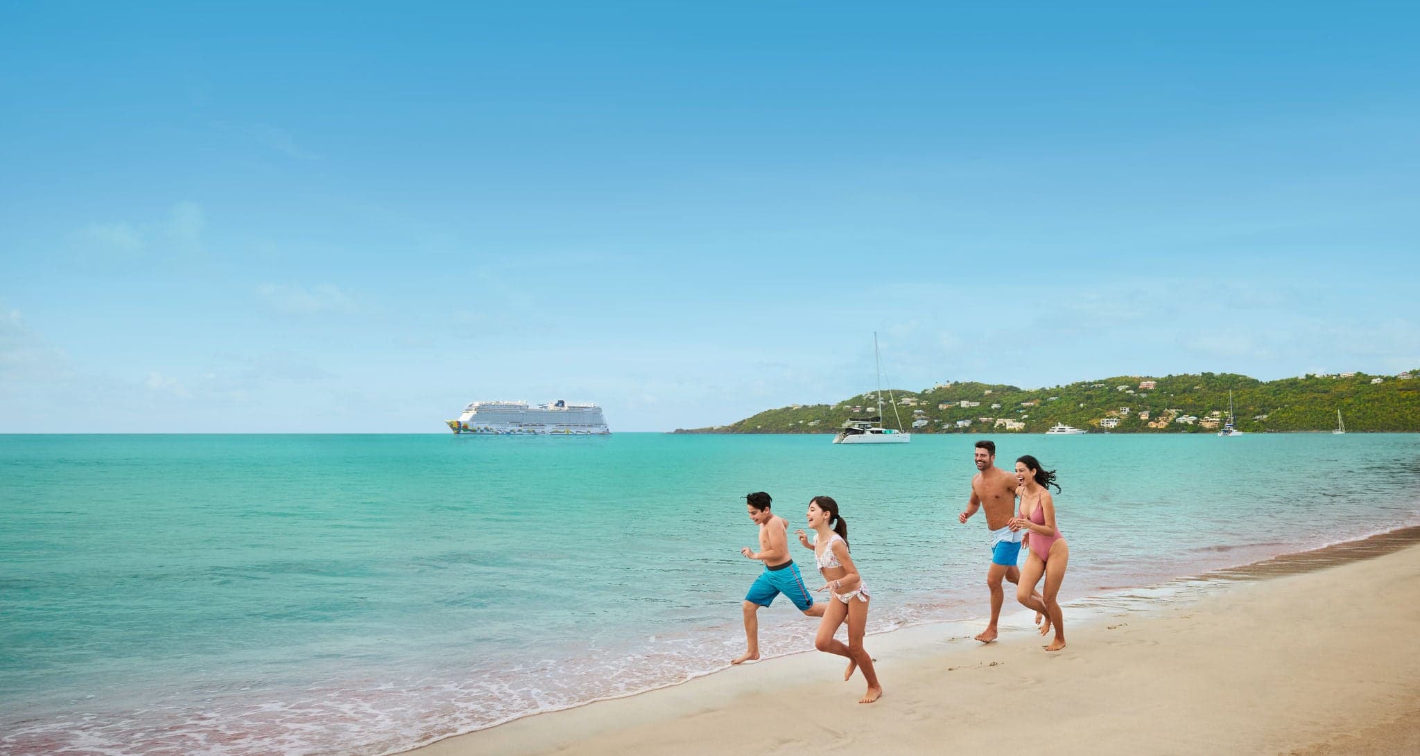 Family on beach in St. Thomas. 