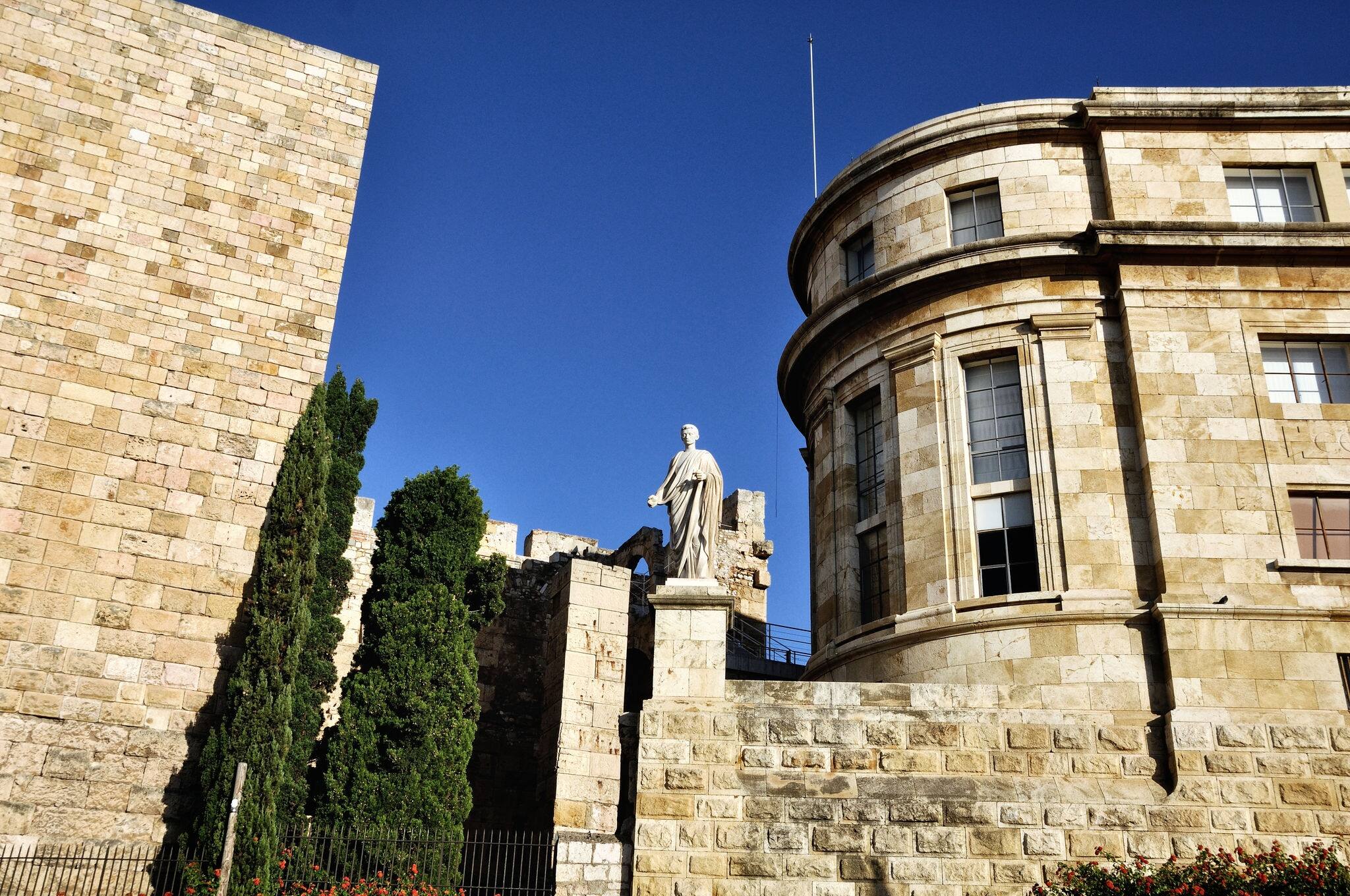 View of National Archaeologic Museum of Tarragona, Spain with Statue