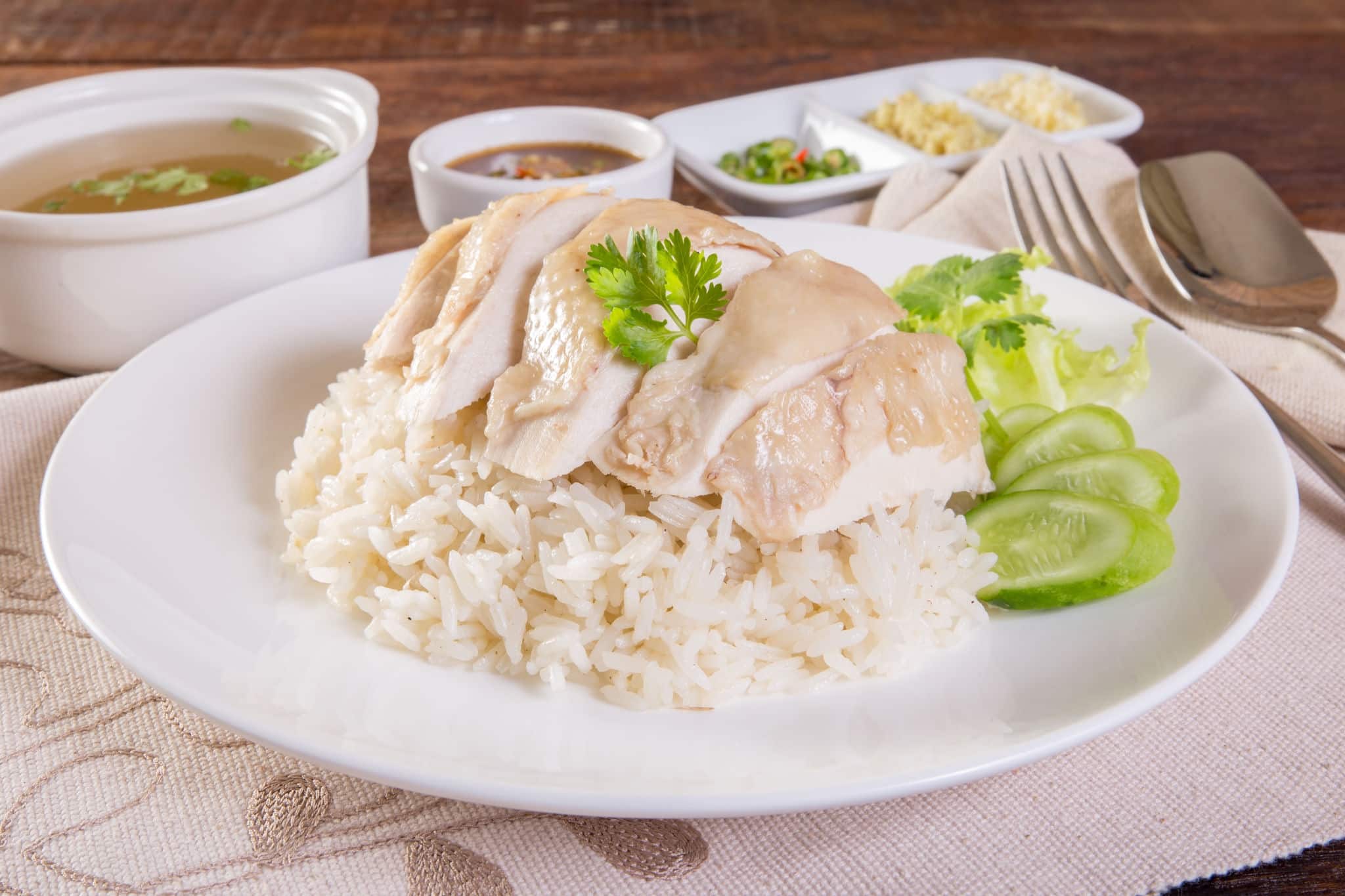 Hainanese chicken rice on the table