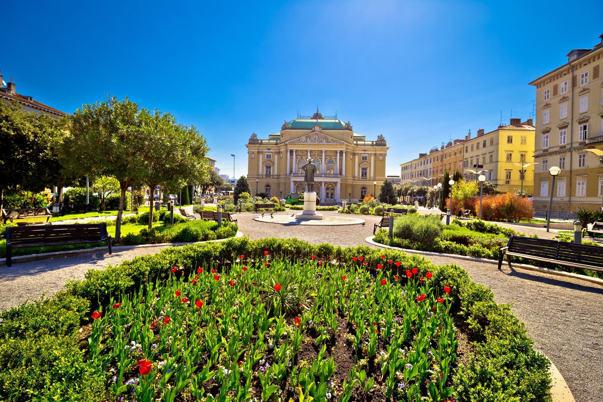 Croatian national theater in Rijeka square view, fountain and architecture, Kvarner bay, Croatia