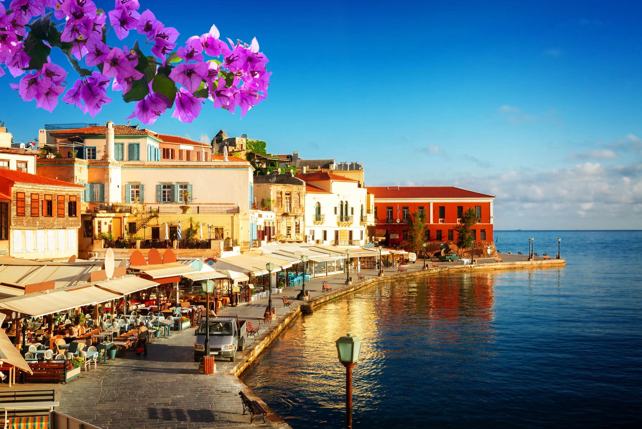 bay of Chania at sunny summer day, Crete Greece with flowers