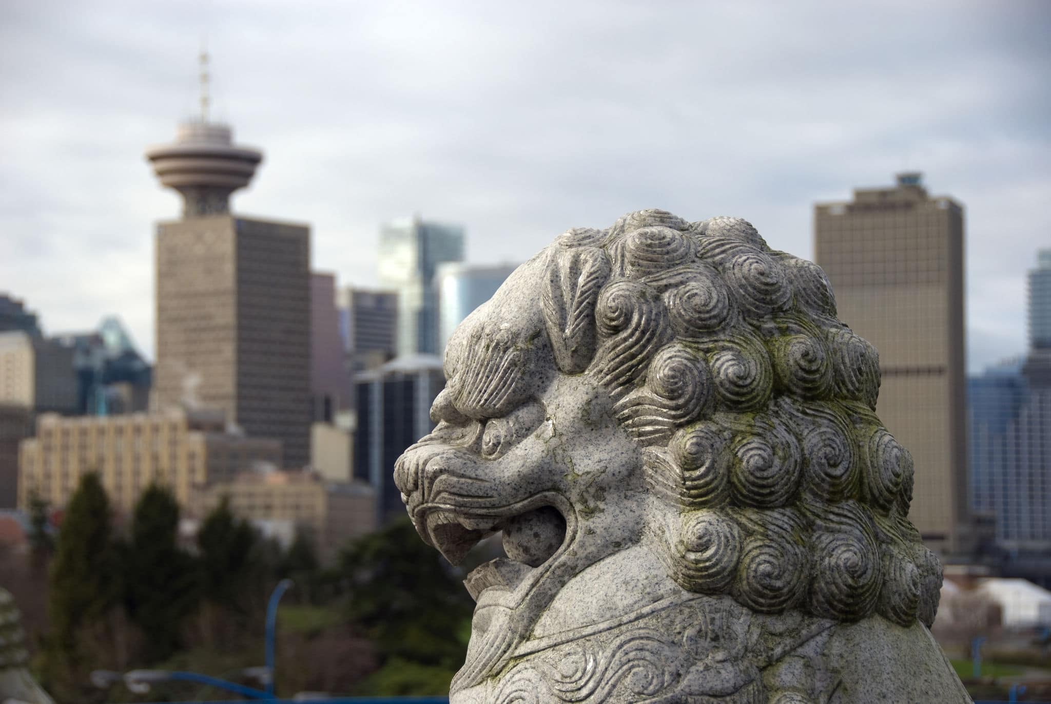 Vancouver Asian Culture. This concept image highlights Vancouvers cultural relationship with its Asian community which is entrenched in Vancouvers history.Vancouver skyline featured in the background.