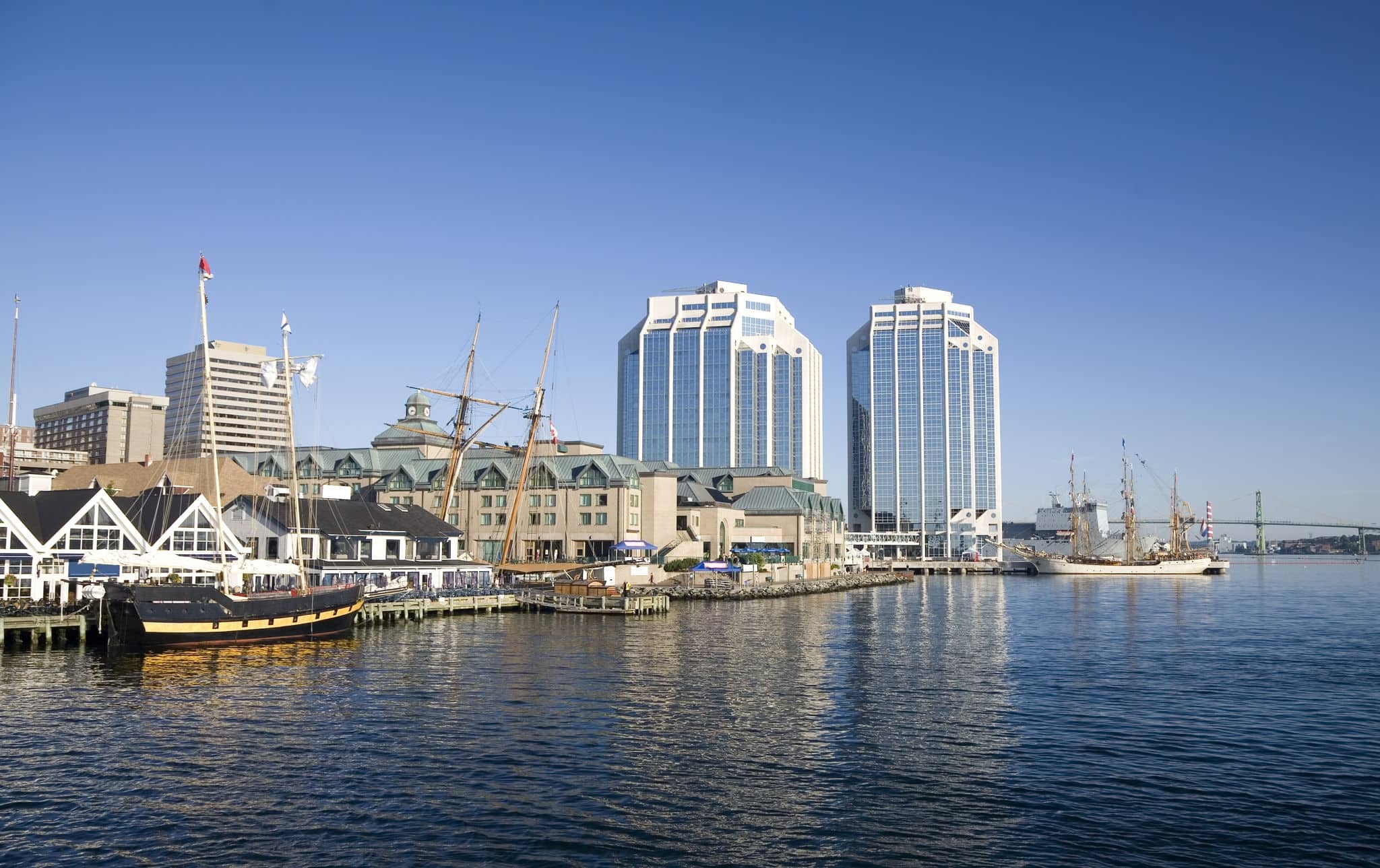 Tall ships docked in the early morning on Halifax's waterfront at Purdy's Wharf and farther down the waterfront during the Nova Scotia Tall Ship Festival 2009.