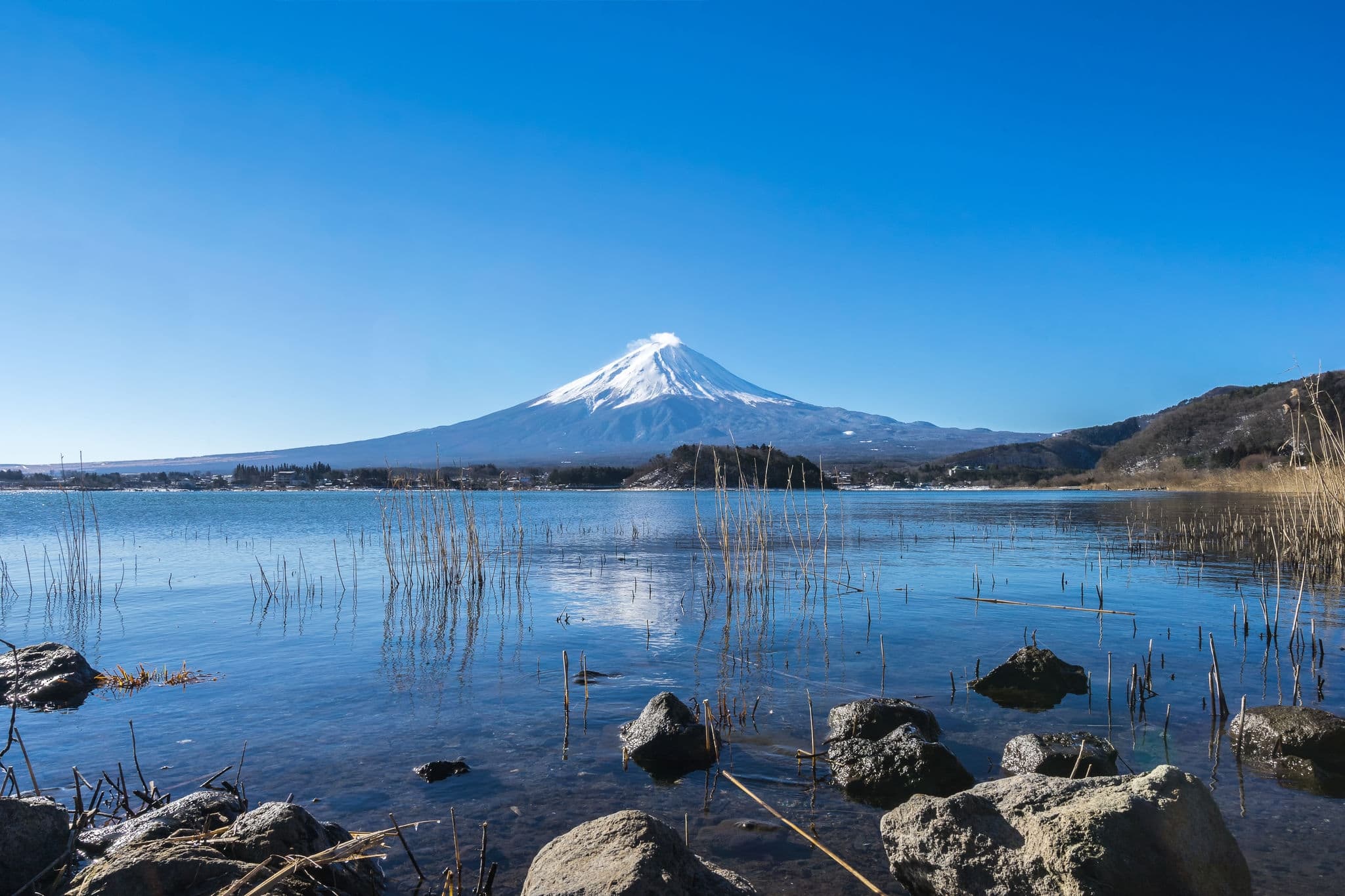 Fujisan in the morning with the reflection on the water
