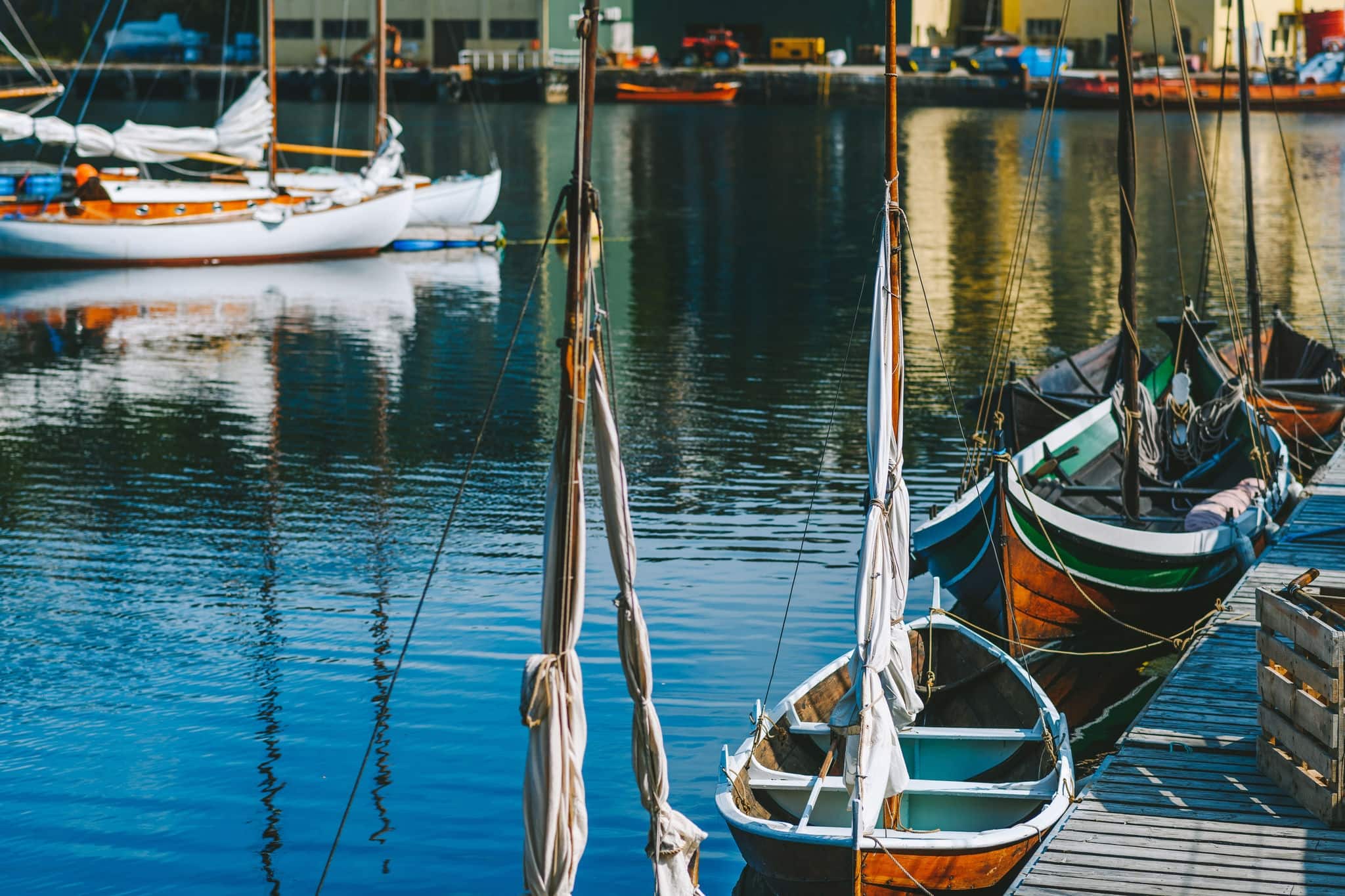Closeup view of boat in the Kristiansund port, on the fjord coast, located in the Norwegian archipelago