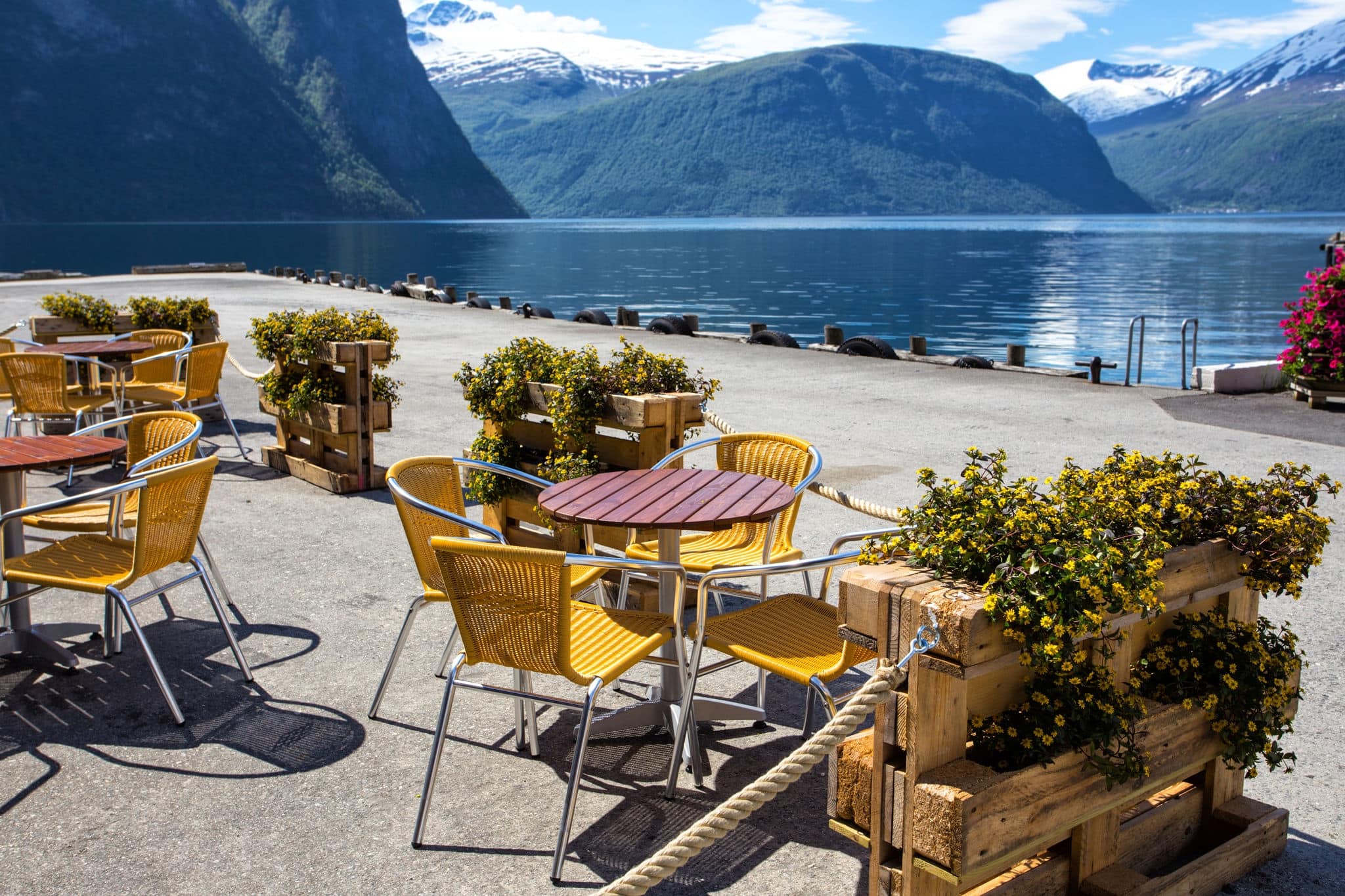 cafe. tables and chairs on the shore of the fjord in Norway