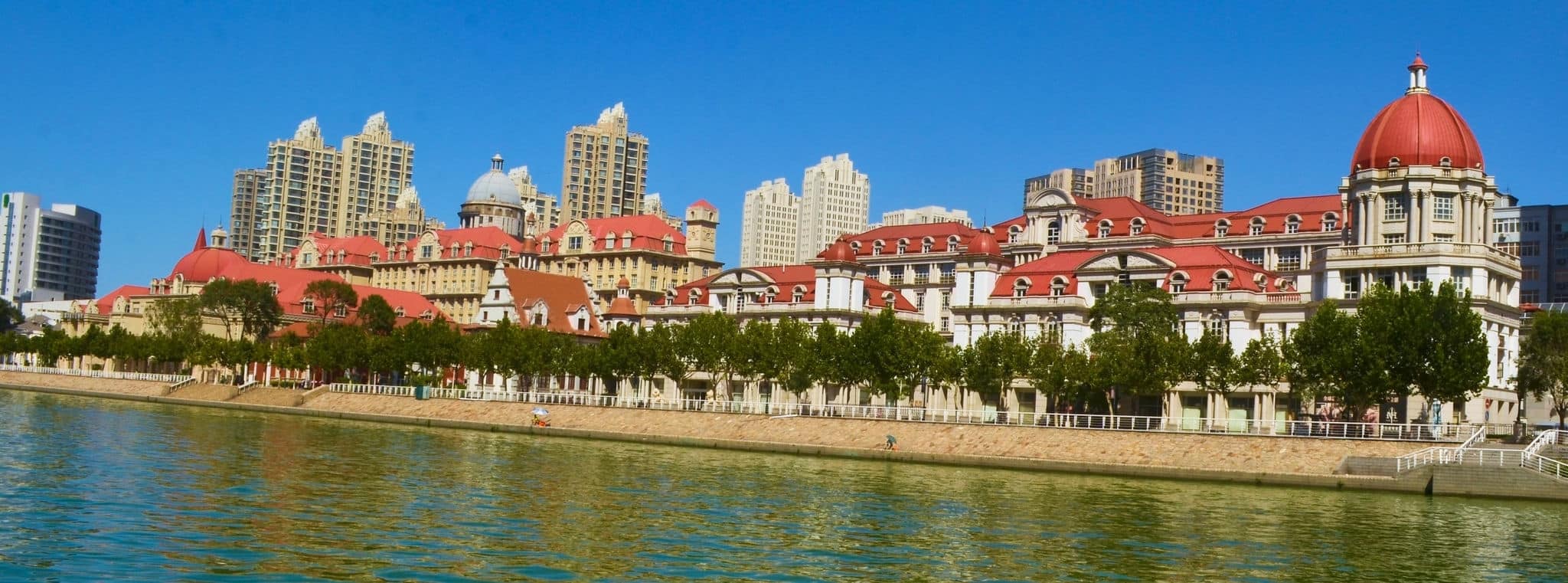 set of historical buildings on a shore of river hai in chinese city tianjin.