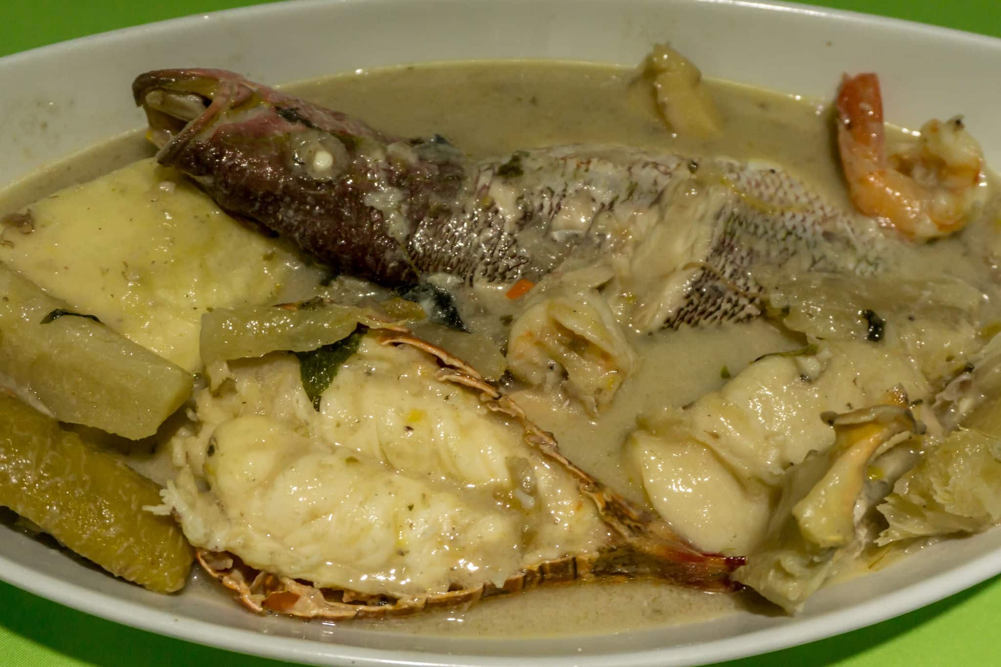 nicaragua typical caribbean food, fish soup with coconut named rondown