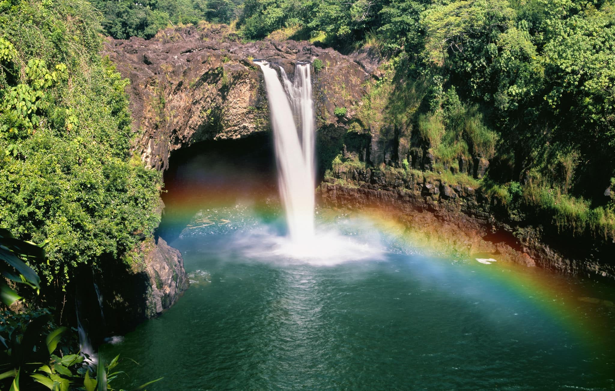 Beautiful Rainbow Waterfalls in Paradise on the Big Island in Hawaii. Wailua Waterfall near the island capital Lihue on the island of Kauai, Hawaii.