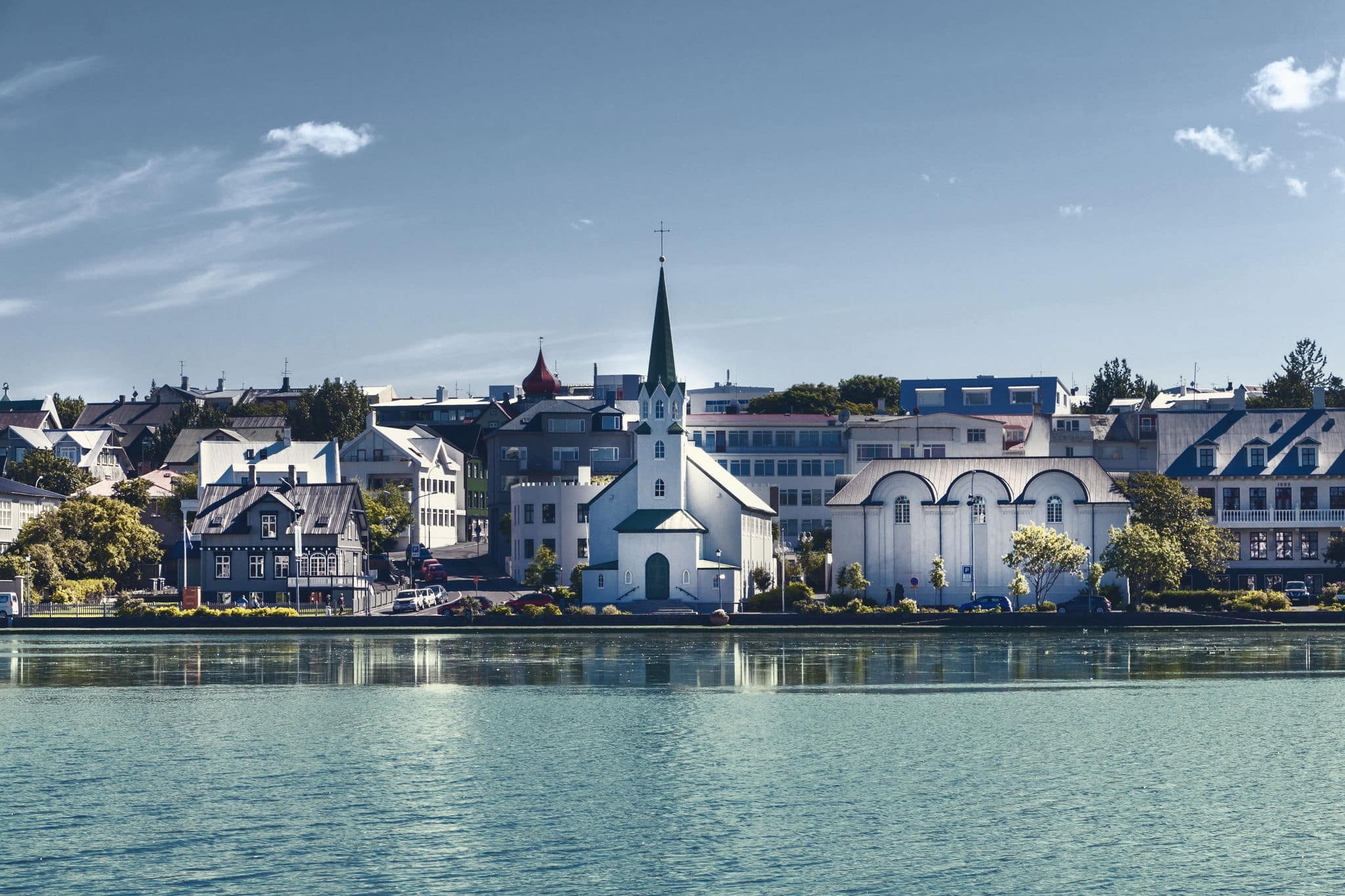 Reykjavic, Iceland city scape - lake quay in city center.