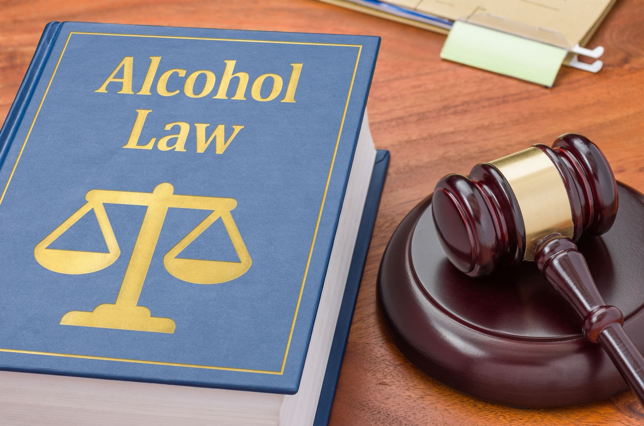 A law book with a gavel - Alcohol law