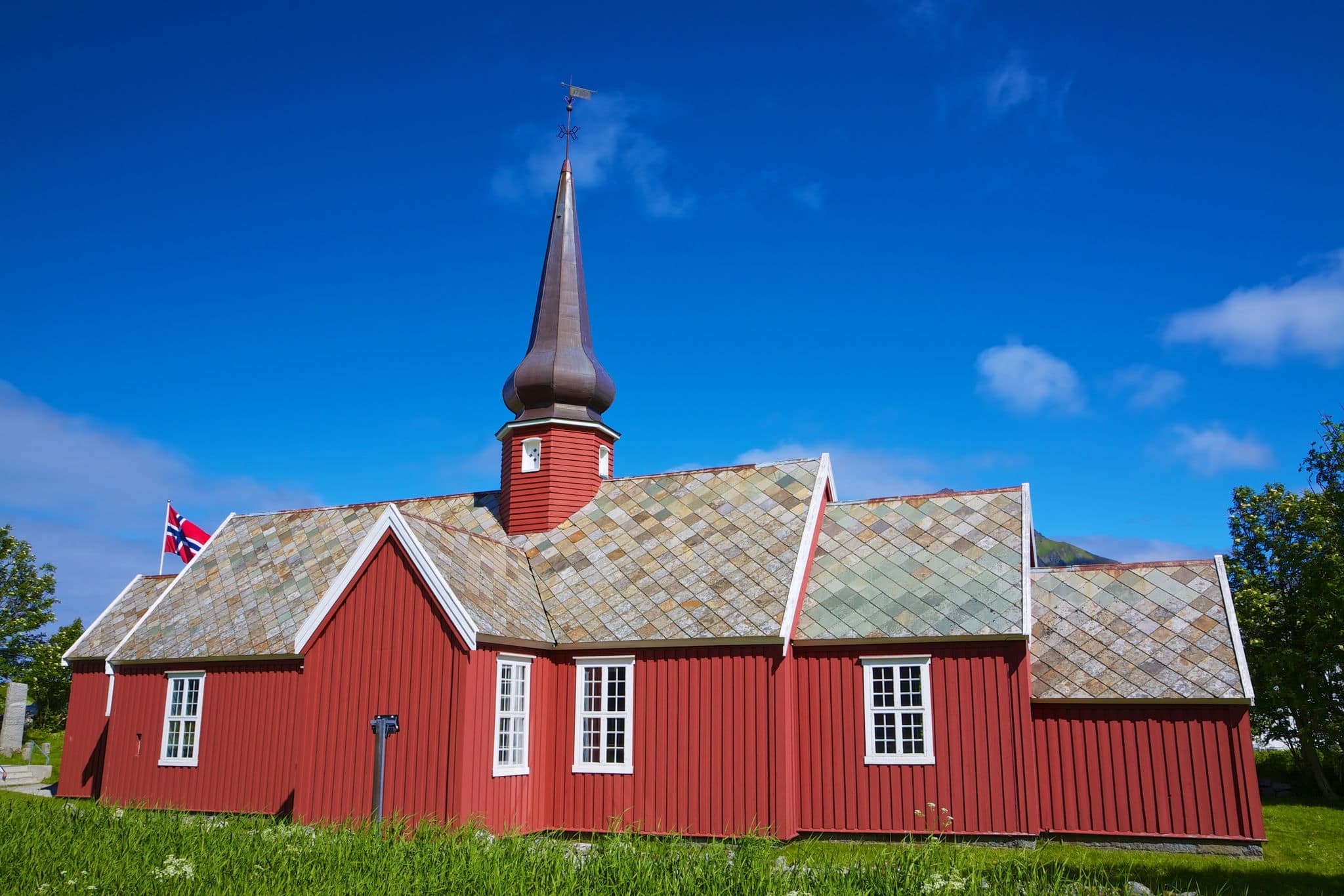 Scenic old red church in Flakstad on Lofoten islands, Norway