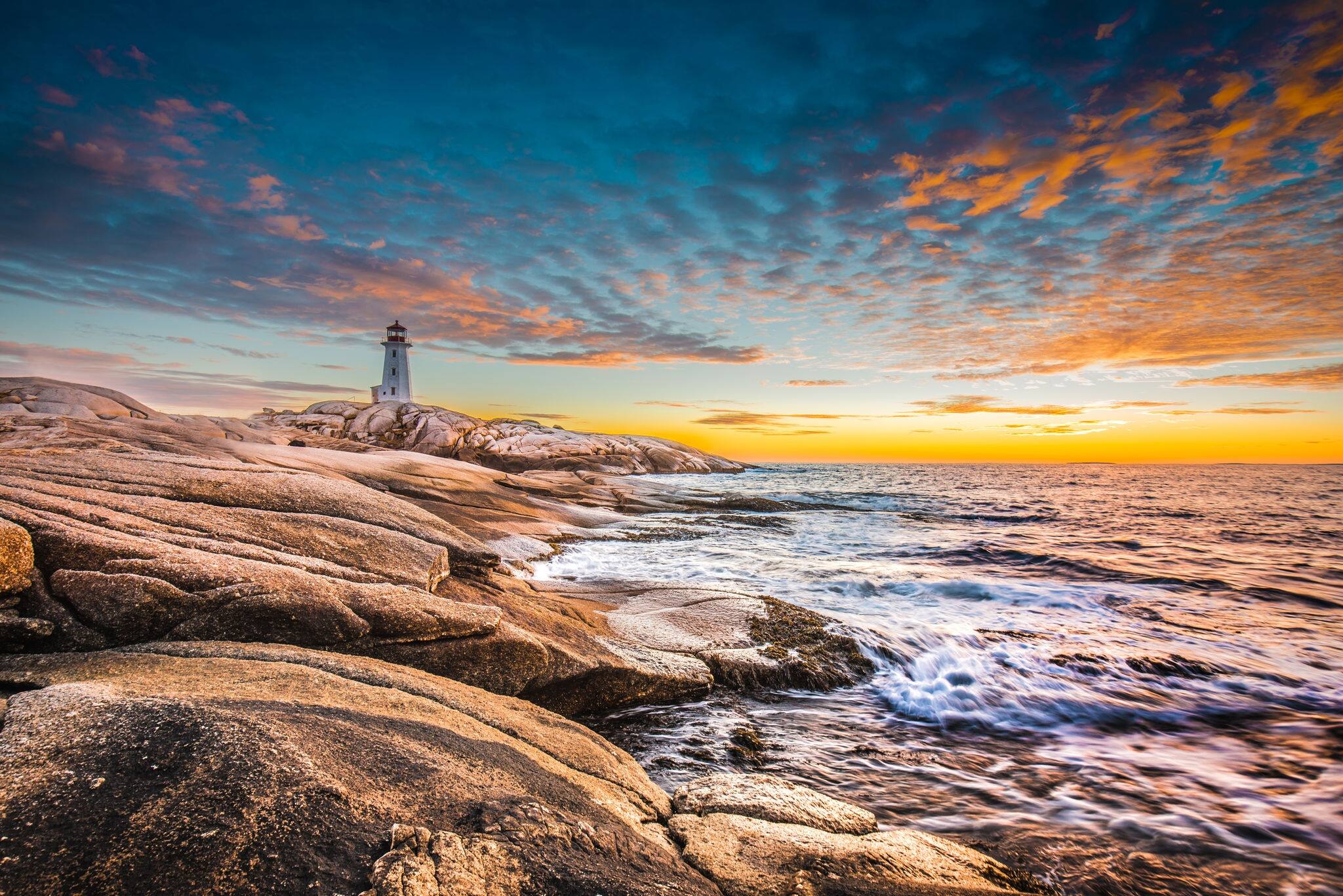 Peggy's cove lighthouse sunset ocean view landscape in Halifax, Nova Scotia