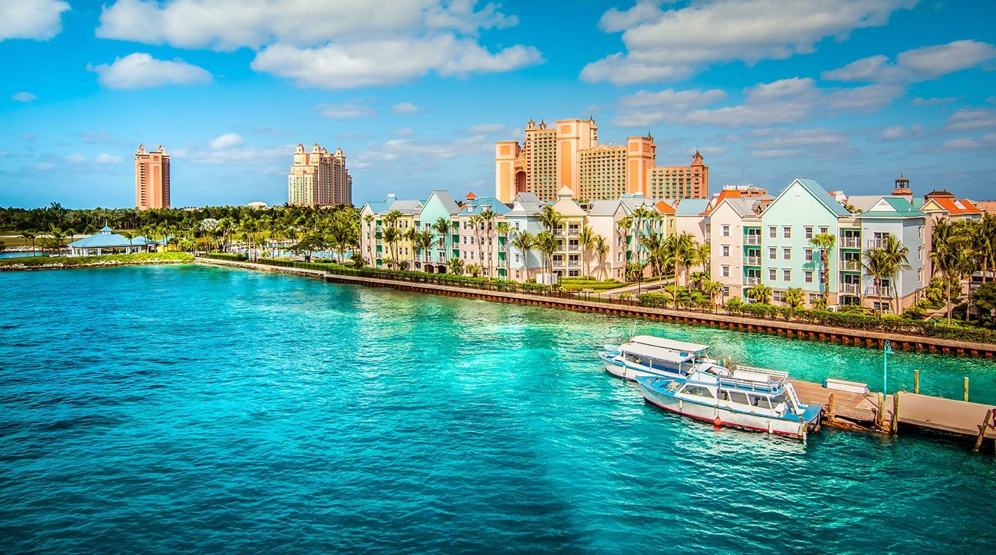 Skyline of Paradise Island with colorful houses at the ferry terminal. Nassau, Bahamas.	