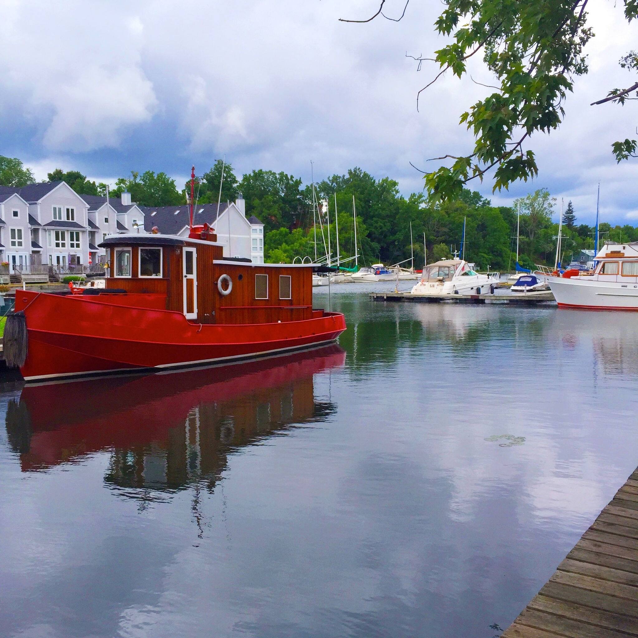 A red boat in Picton Harbor.