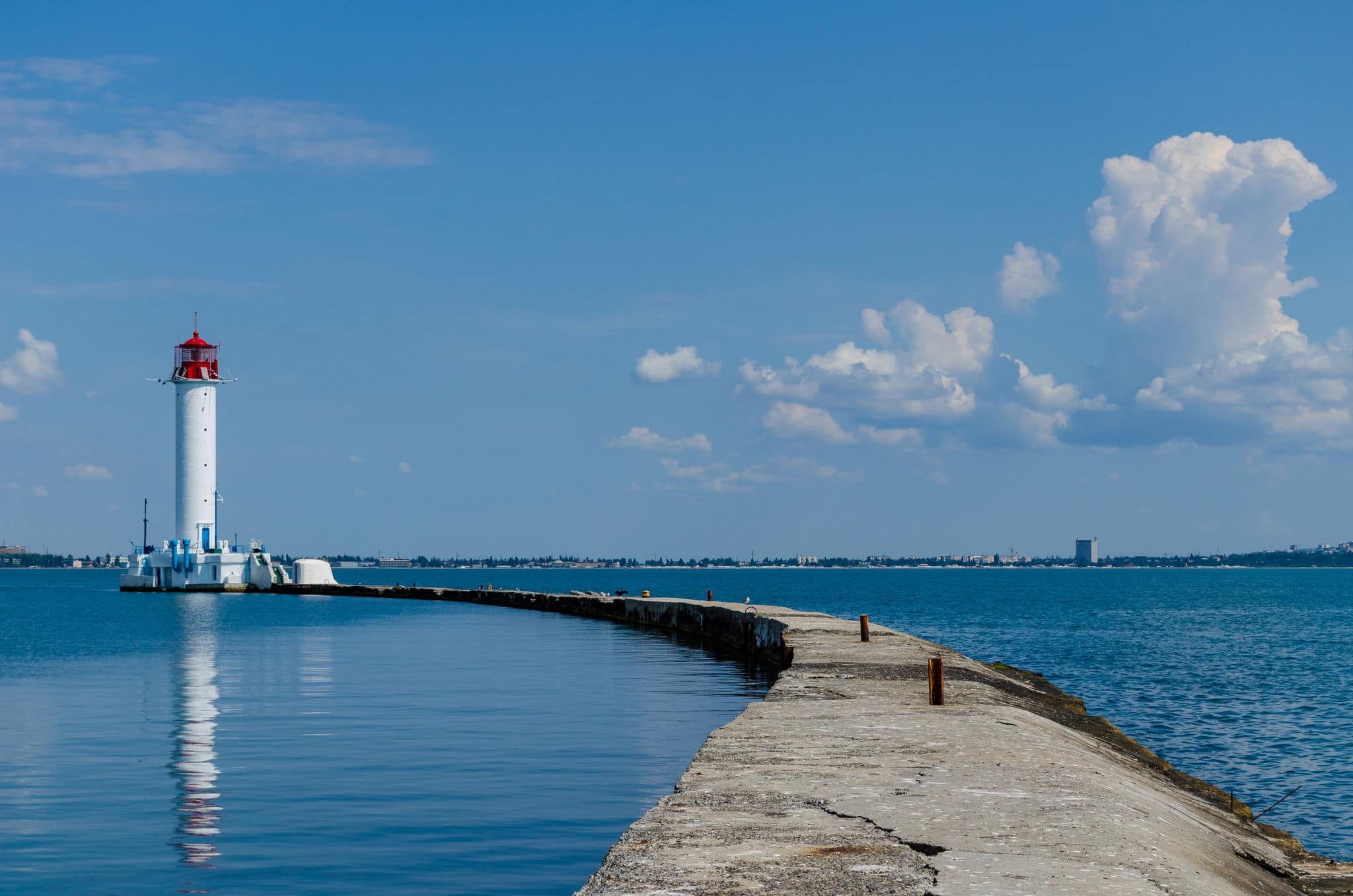 Seascape with lighthouse on the Black Sea in Odesa during the summer season