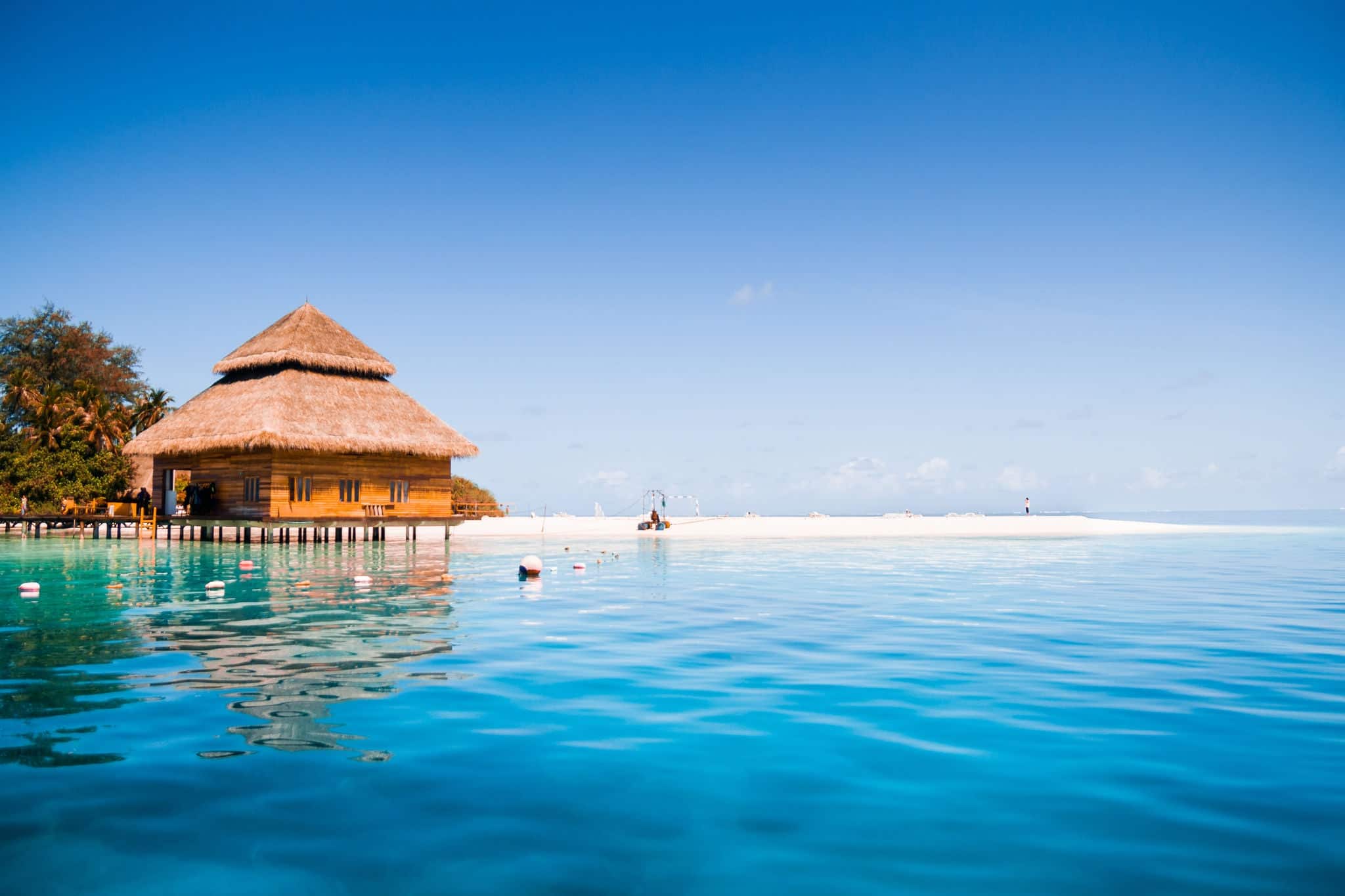 Over water bungalows with steps into amazing green lagoon