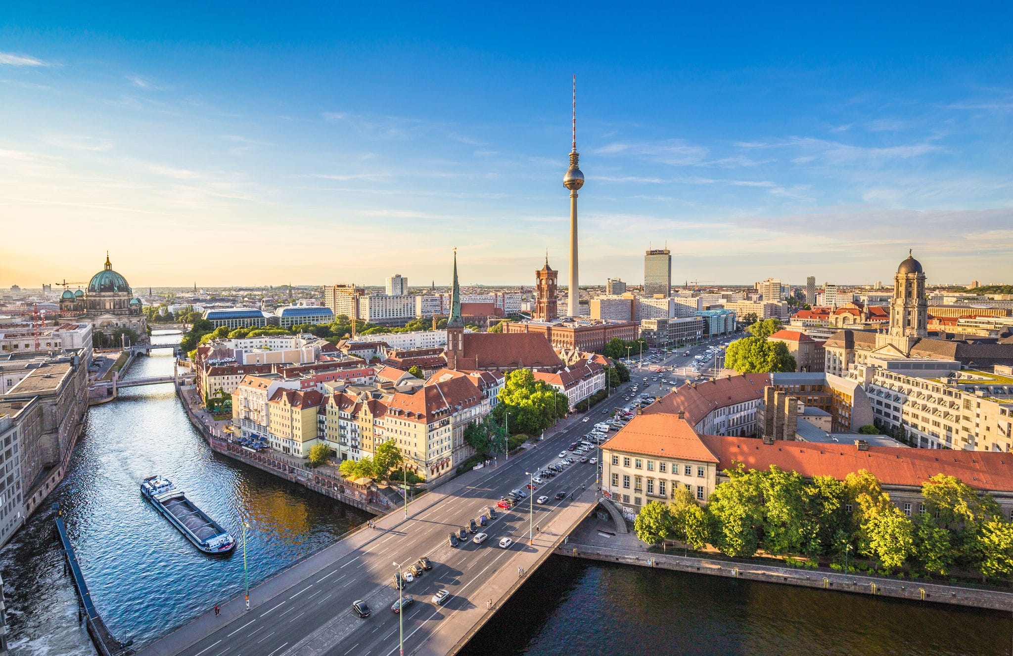 Aerial view of Berlin skyline and Spree river in beautiful evening light at sunset in summer, Germany