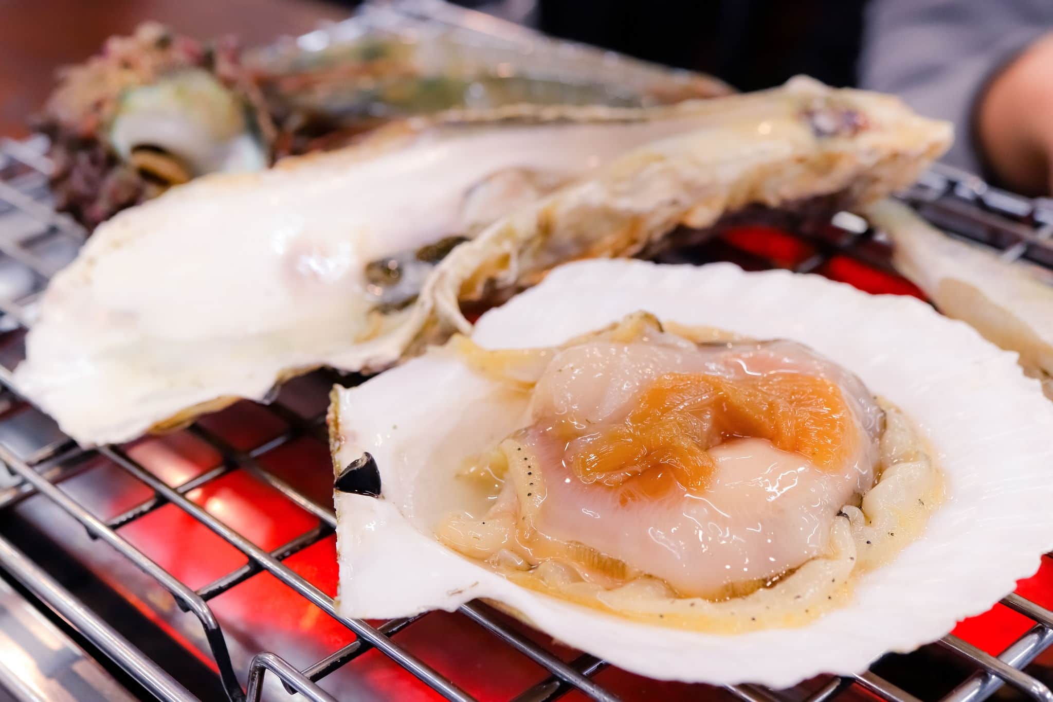 Delicious grilled fresh scallop seafood called "Hotate" in japan