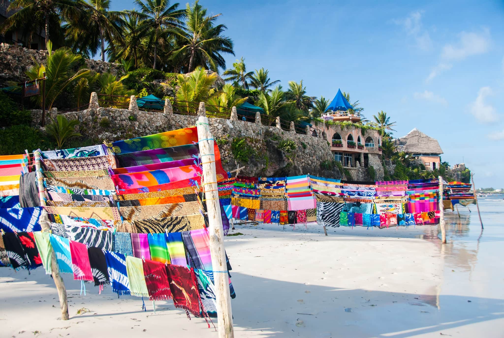 Bright fabric for sale on a white sand beach in a beautiful holiday location