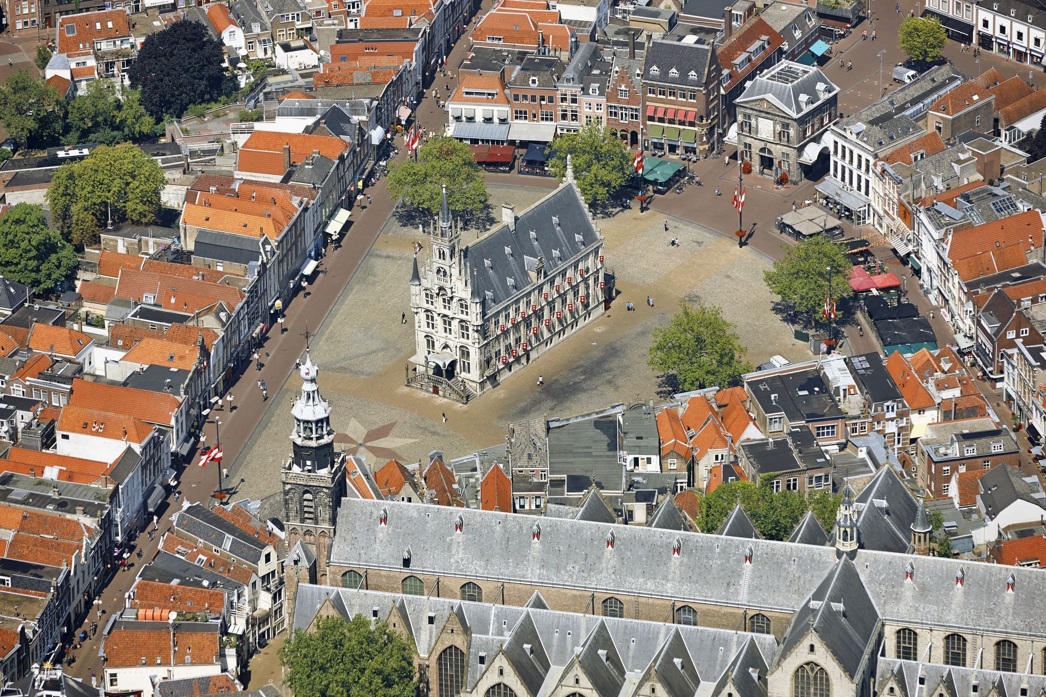 Aerial view of the city of Gouda with the old Town-hall, Weigh-house and St. John church in the province of Zuid-Holland, the Netherlands.